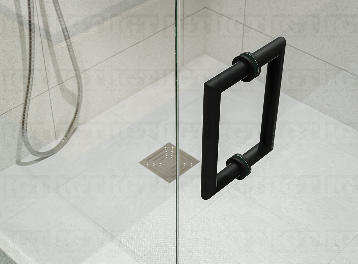 An aerial close-up of the 6" Mitered Corner Pull Handle installed on a frameless glass shower door, showcasing its sleek mitered corners. Matte Black.