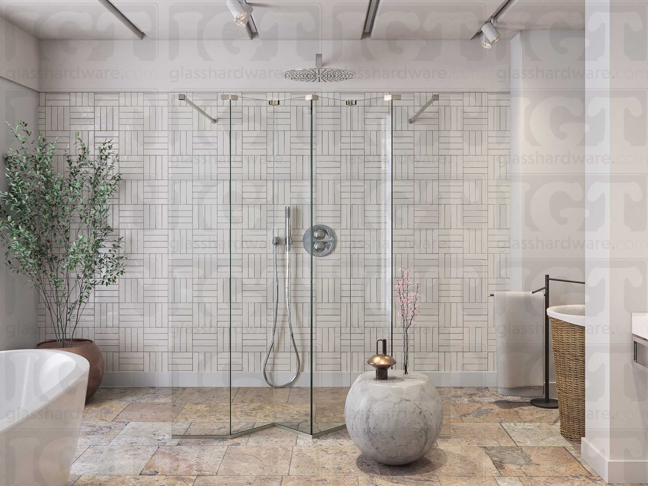 A modern bathroom featuring a doorless glass shower enclosure, using various Glass-to-Glass Adjustable Sleeve Over Clamps to hold the panels together. Brushed Nickel.