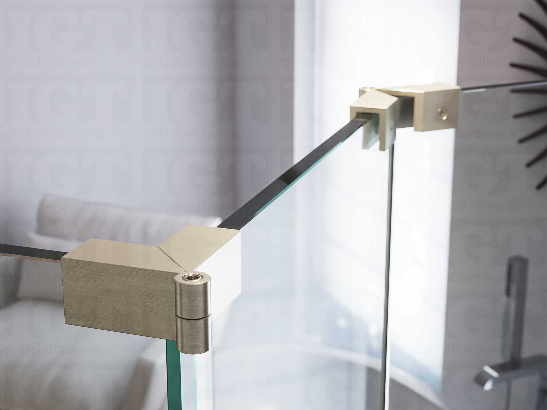 A close up of two Glass-to-Glass Adjustable Sleeve Over Clamps installed on a doorless glass shower enclosure. Brushed Nickel.