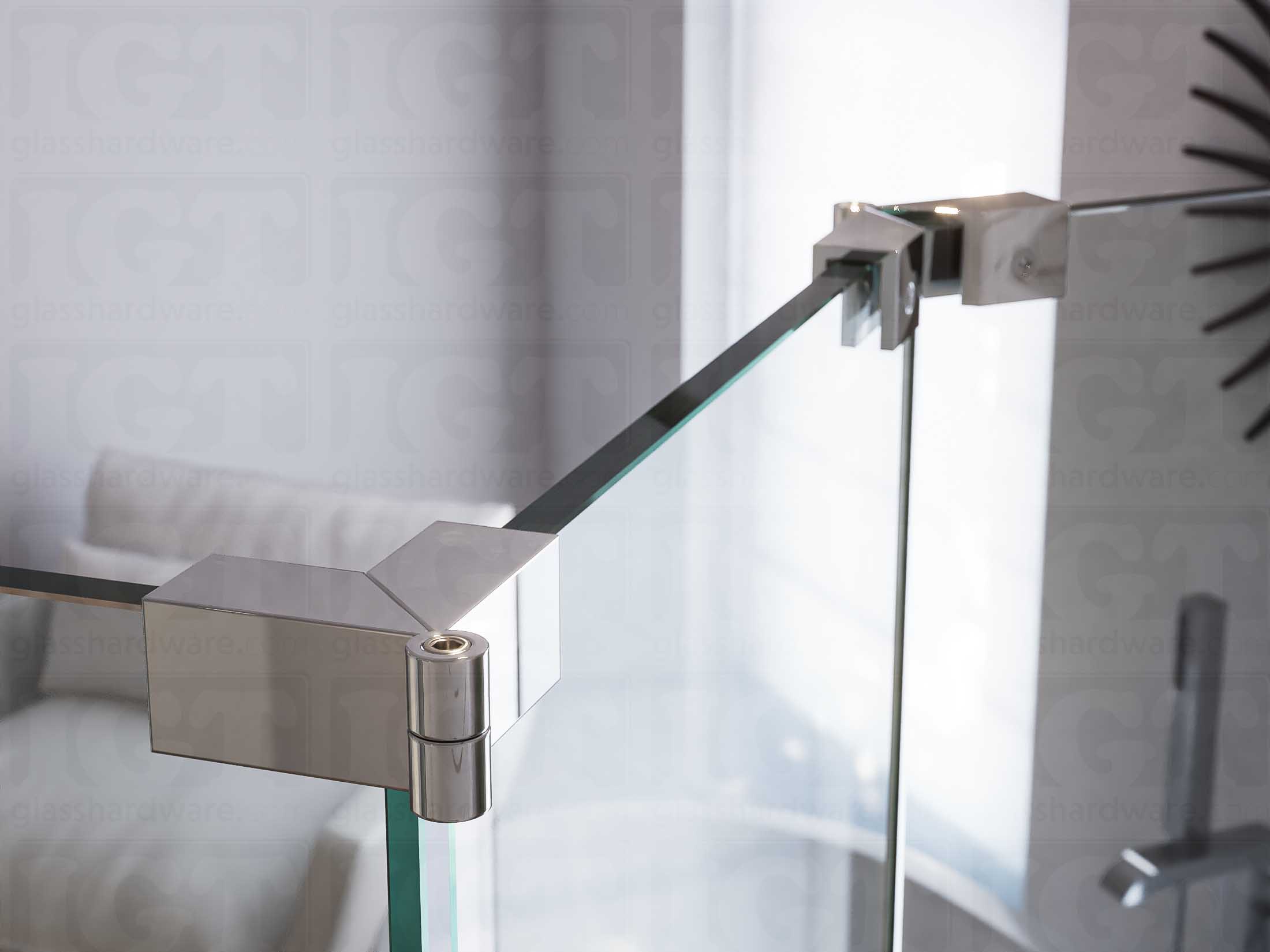 A close up of two Glass-to-Glass Adjustable Sleeve Over Clamps installed on a doorless glass shower enclosure. Chrome Polished.