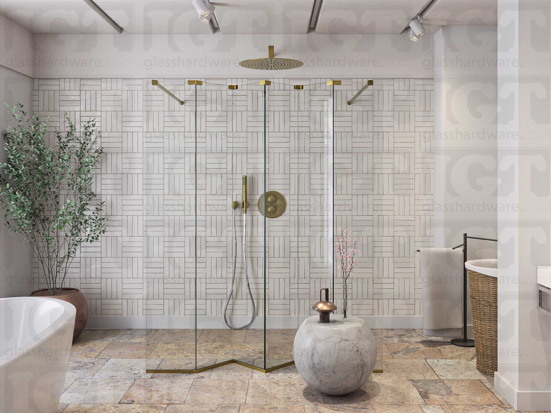 A modern bathroom featuring a doorless glass shower enclosure, using various Glass-to-Glass Adjustable Sleeve Over Clamps to hold the panels together. Gold Brushed.