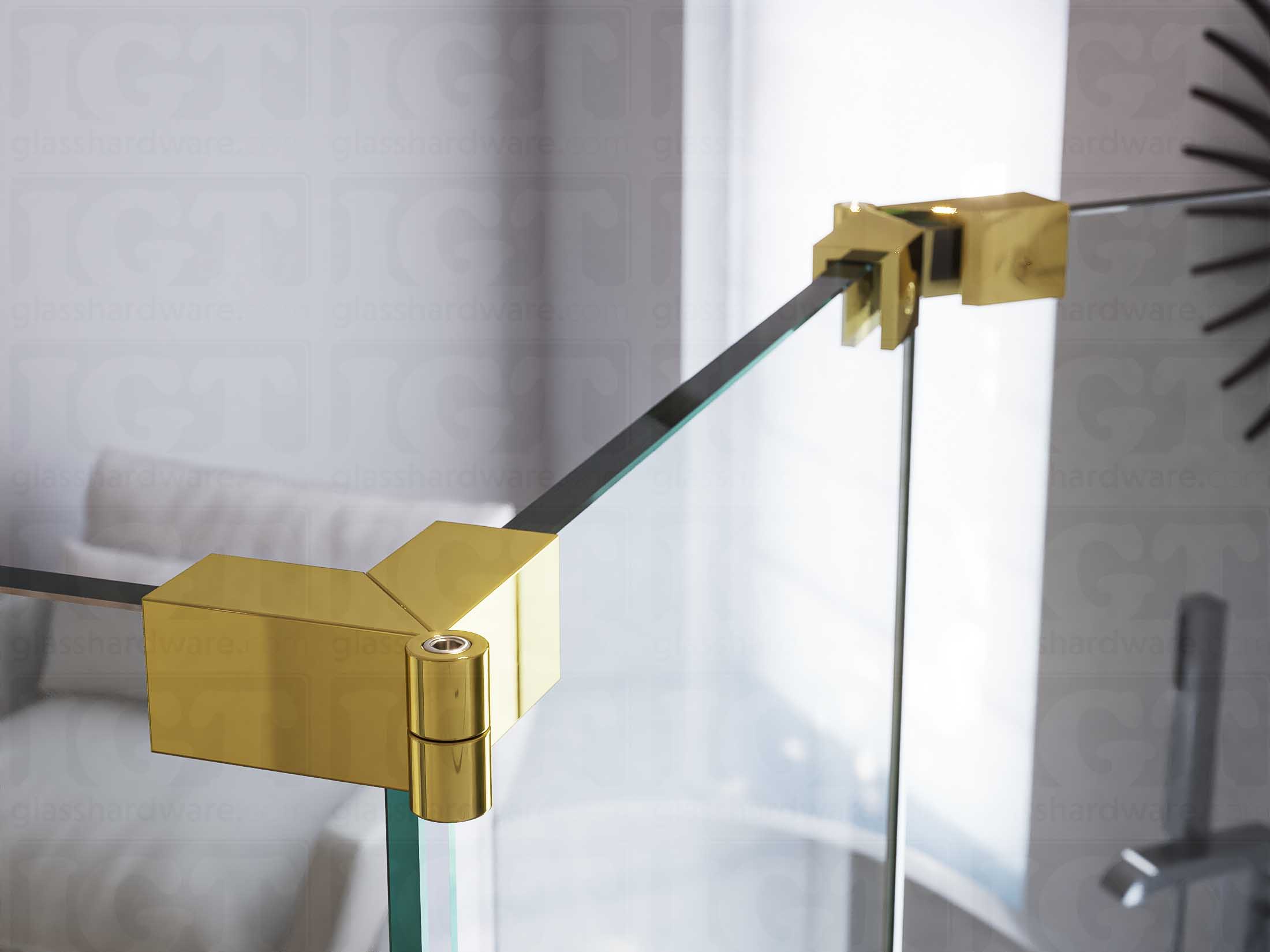 A close up of two Glass-to-Glass Adjustable Sleeve Over Clamps installed on a doorless glass shower enclosure. Polished Brass.