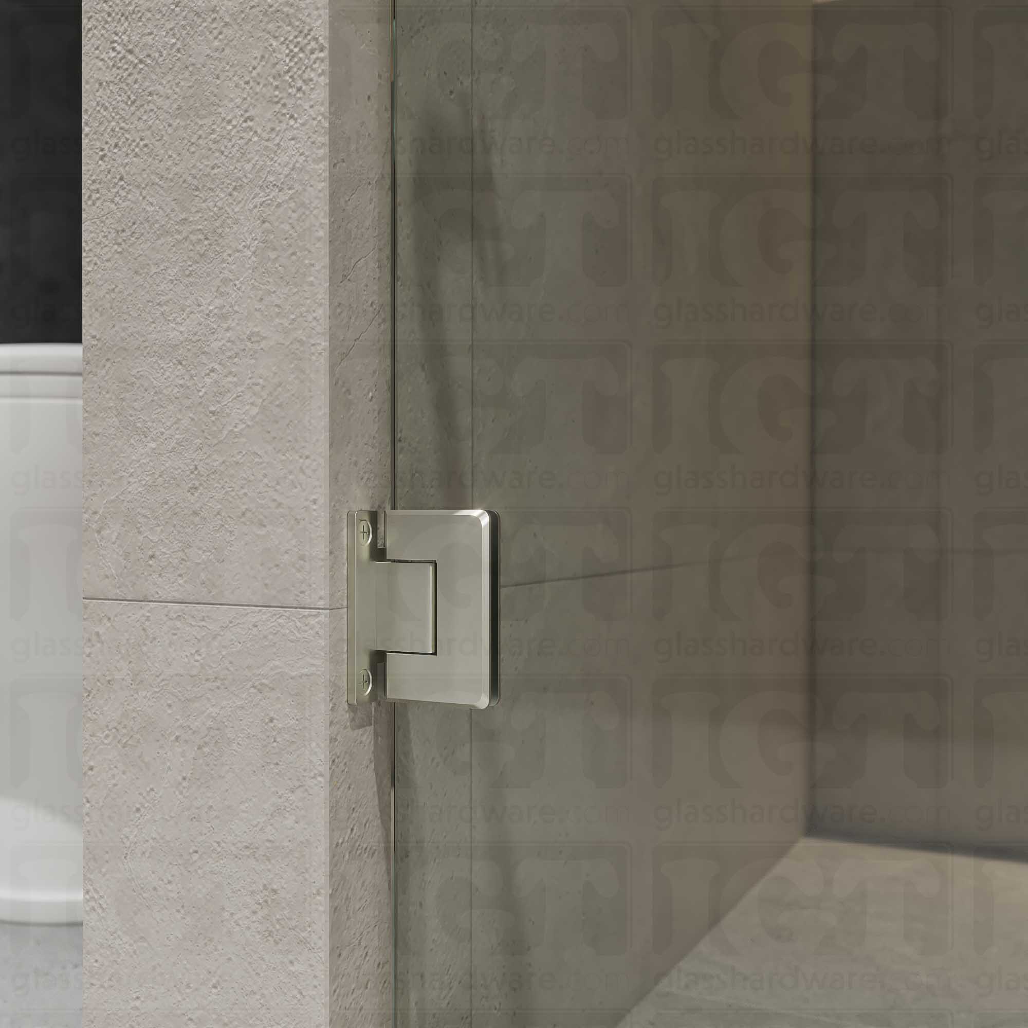 A close-up view of the Wall-to-Glass "H" Back Bilboa Hinge showcasing it's Brushed Nickel finish in more detail.