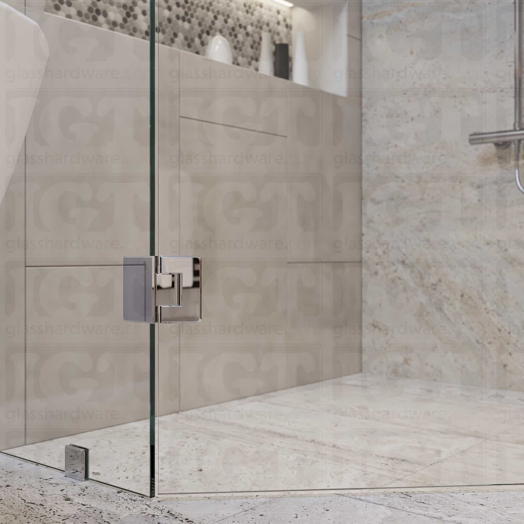 A close-up view of the bottom Glass-to-Glass 135 Degree Bilboa Hinge installed on a modern shower door. Chrome Polished.