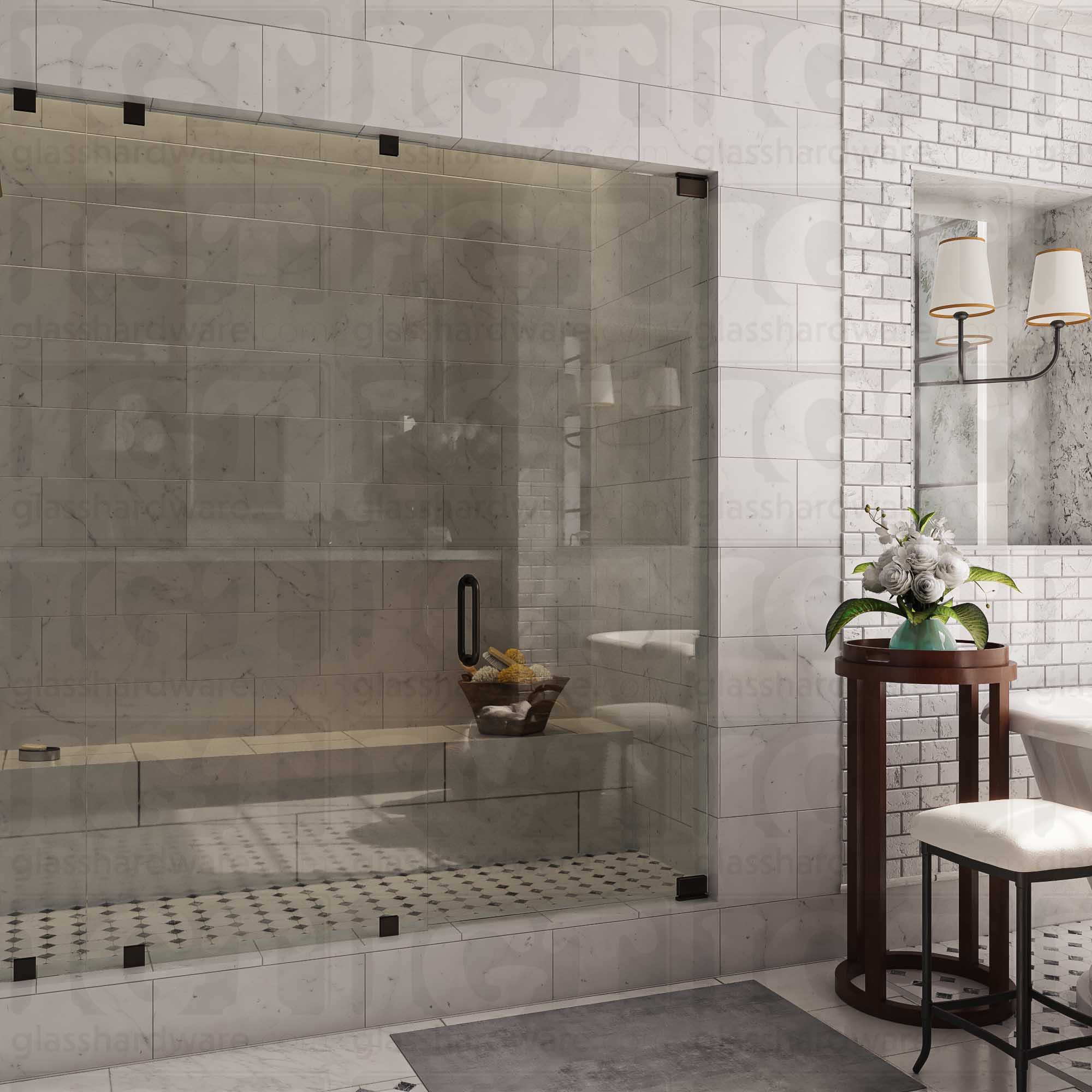 An elegant bathroom interior featuring a glass shower enclosure with two Top and Bottom Bilboa Pivot Hinges for the shower door. The space has a marble-tiled shower with a built-in bench. Soft, ambient lighting highlights the luxurious finishes, creating a warm and sophisticated atmosphere. Oil Rubbed Bronze.