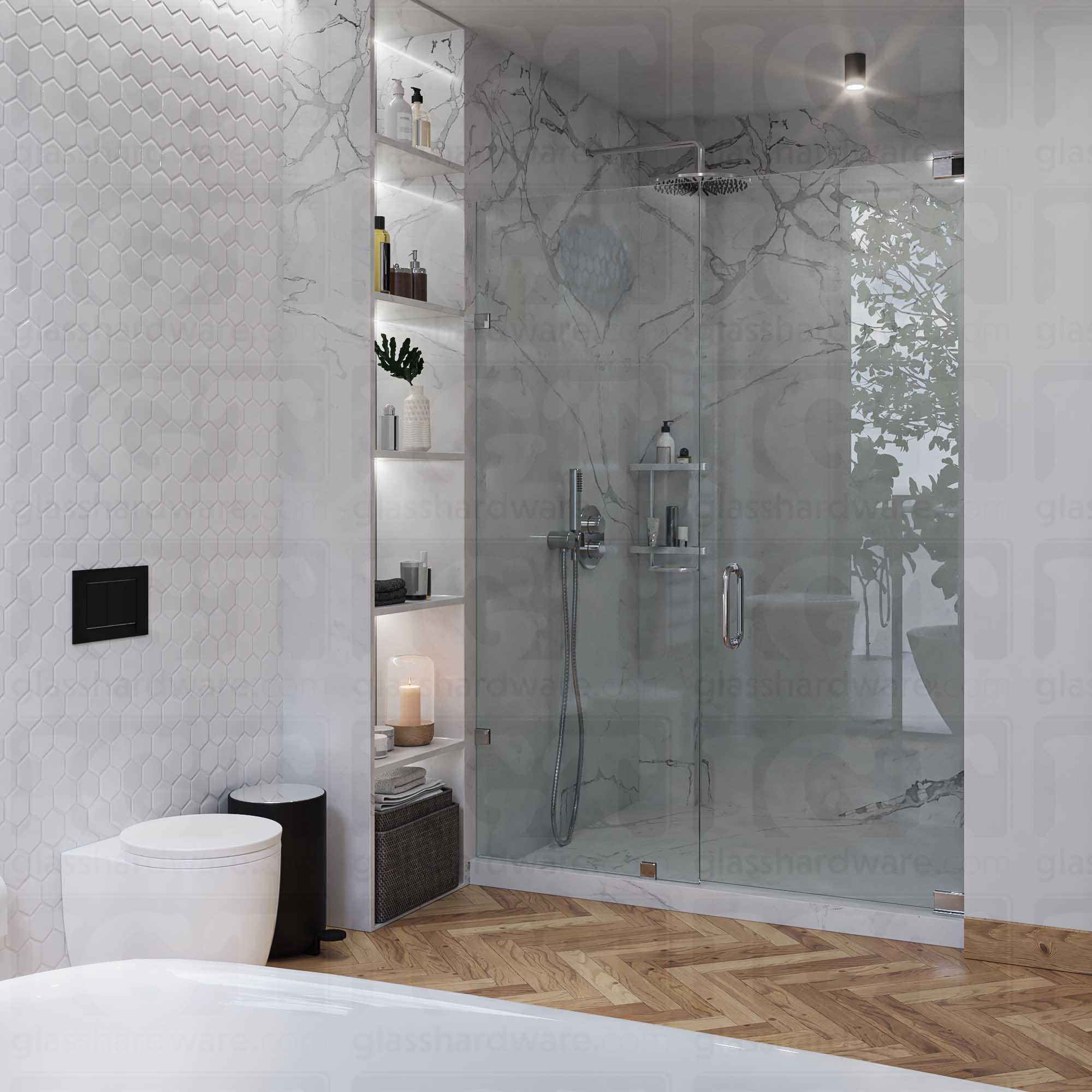 A modern bathroom featuring a frameless glass shower enclosure with a marble-patterned back wall. The shower door is secured by a bottom and a top pivot hinge, including the Left Wall Mount Bilboa Pivot Hinge mounted to the wall. The bathroom's clean design includes hexagonal wall tiles, built-in shelving for toiletries, and a warm wood herringbone floor, creating a luxurious and contemporary atmosphere. Chrome Polished.