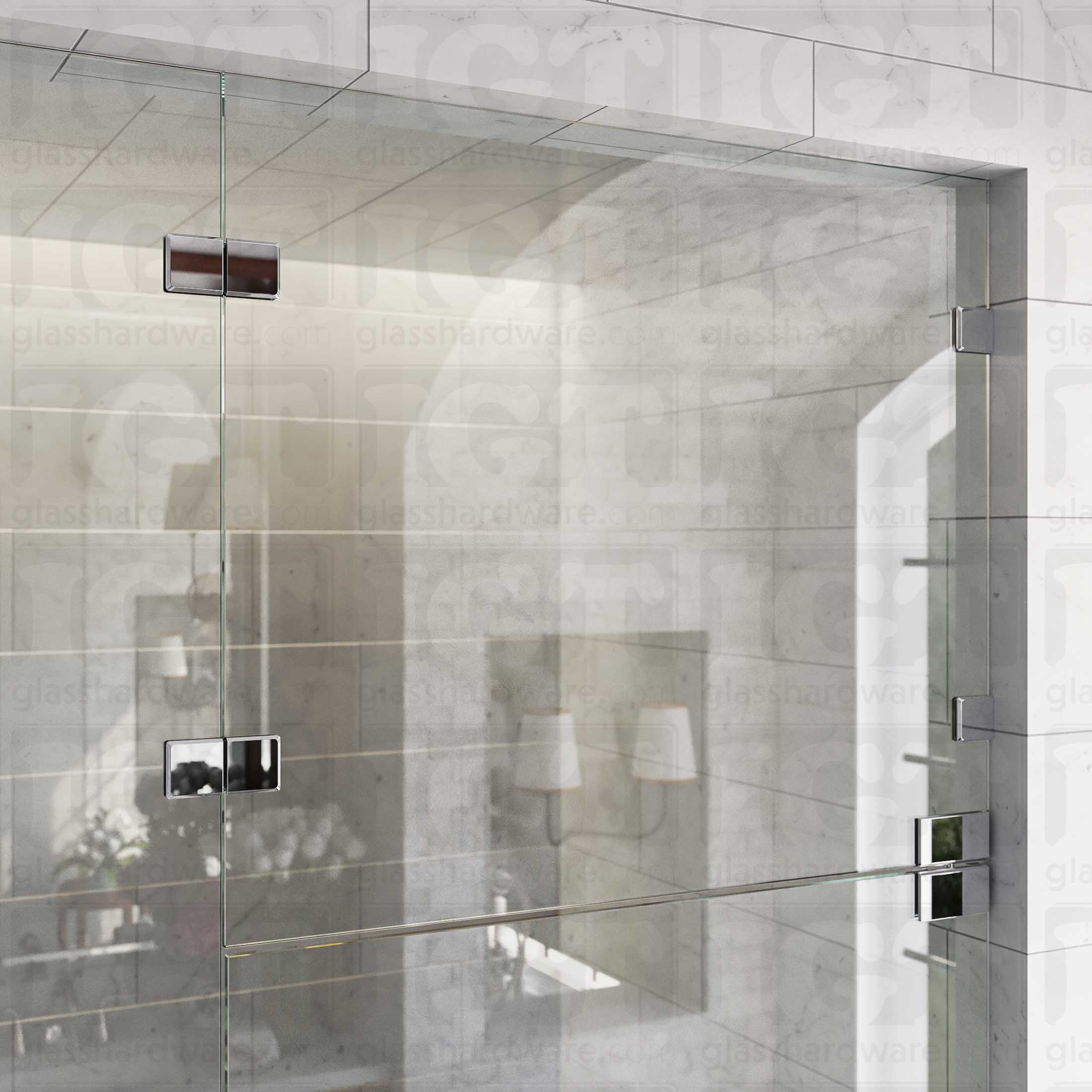 An upper view of the shower's glass panels, secured with Glass-to-Glass 180 Degree Bilboa Clamps (Split Face) alongside a matching hinge for the door. The hardware's corresponding finishes give the shower elegance and cohesiveness. Chrome Polished.