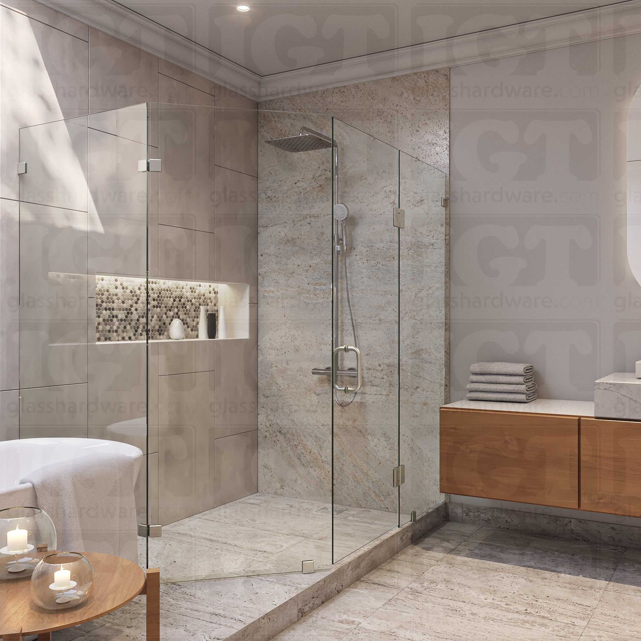 A modern bathroom featuring a frameless neo angle shower enclosure, secured by Glass-to-Glass 135 Degree Bilboa Clamps. The shower's frameless design complements the bathroom's overall earthy and minimalist aesthetic. Brushed Nickel.