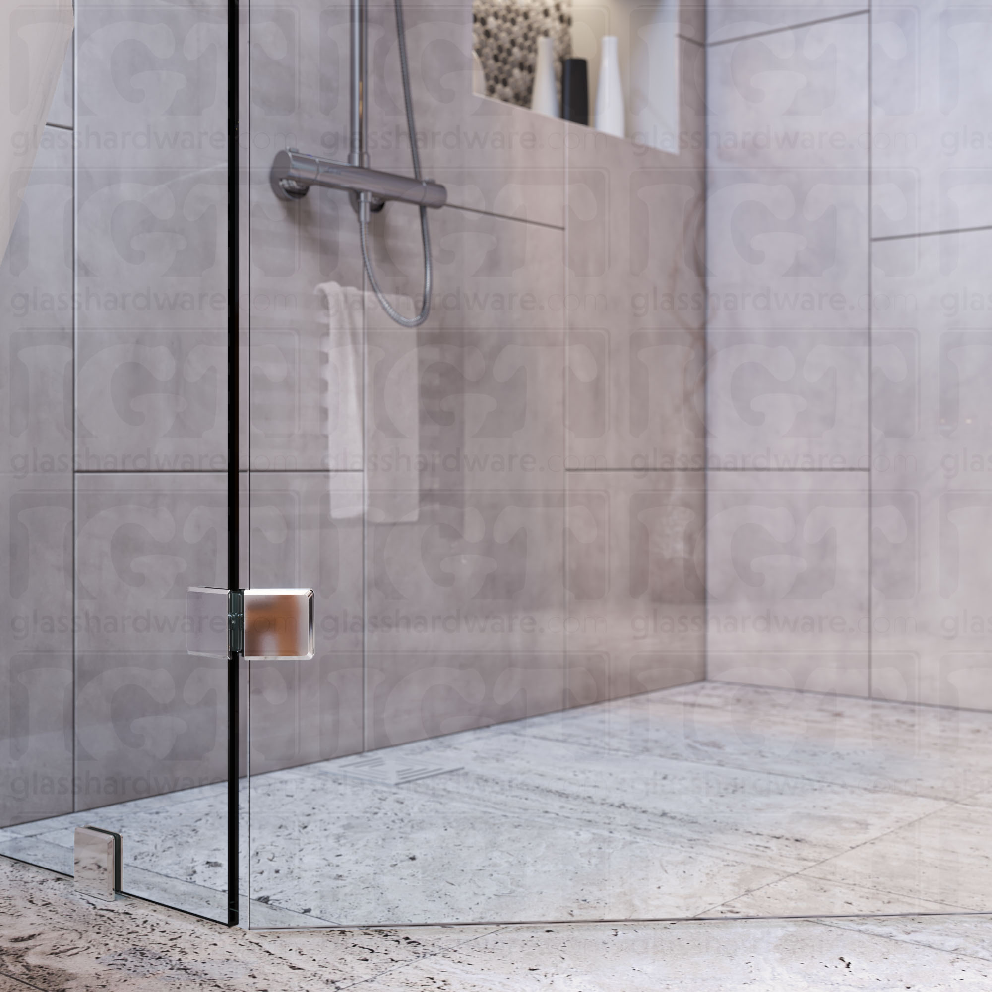 A bottom view of the neo-angle shower's fixed panels, secured by a floor mounted clamp and the Glass-to-Glass 135 Degree Bilboa clamp. The shower's look is enhanced by the hardware's matching finish and beveled-edge design. Chrome Polished.