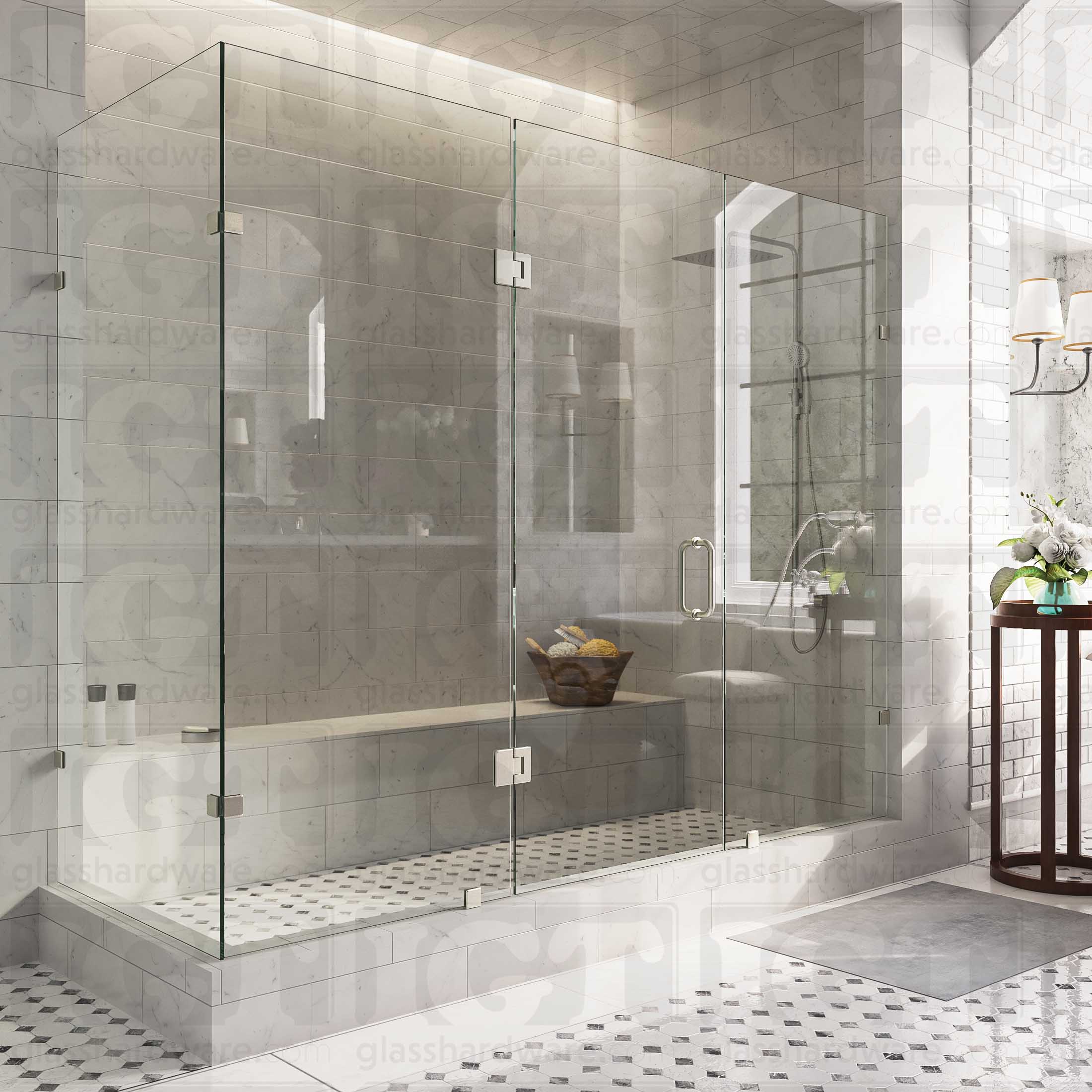 An elegant bathroom featuring a frameless glass shower enclosure, secured with Glass-to-Glass 90 Degree Bilboa Clamps. The shower's frameless design elevates the bathroom's clean and luxurious aesthetic. Brushed Nickel.