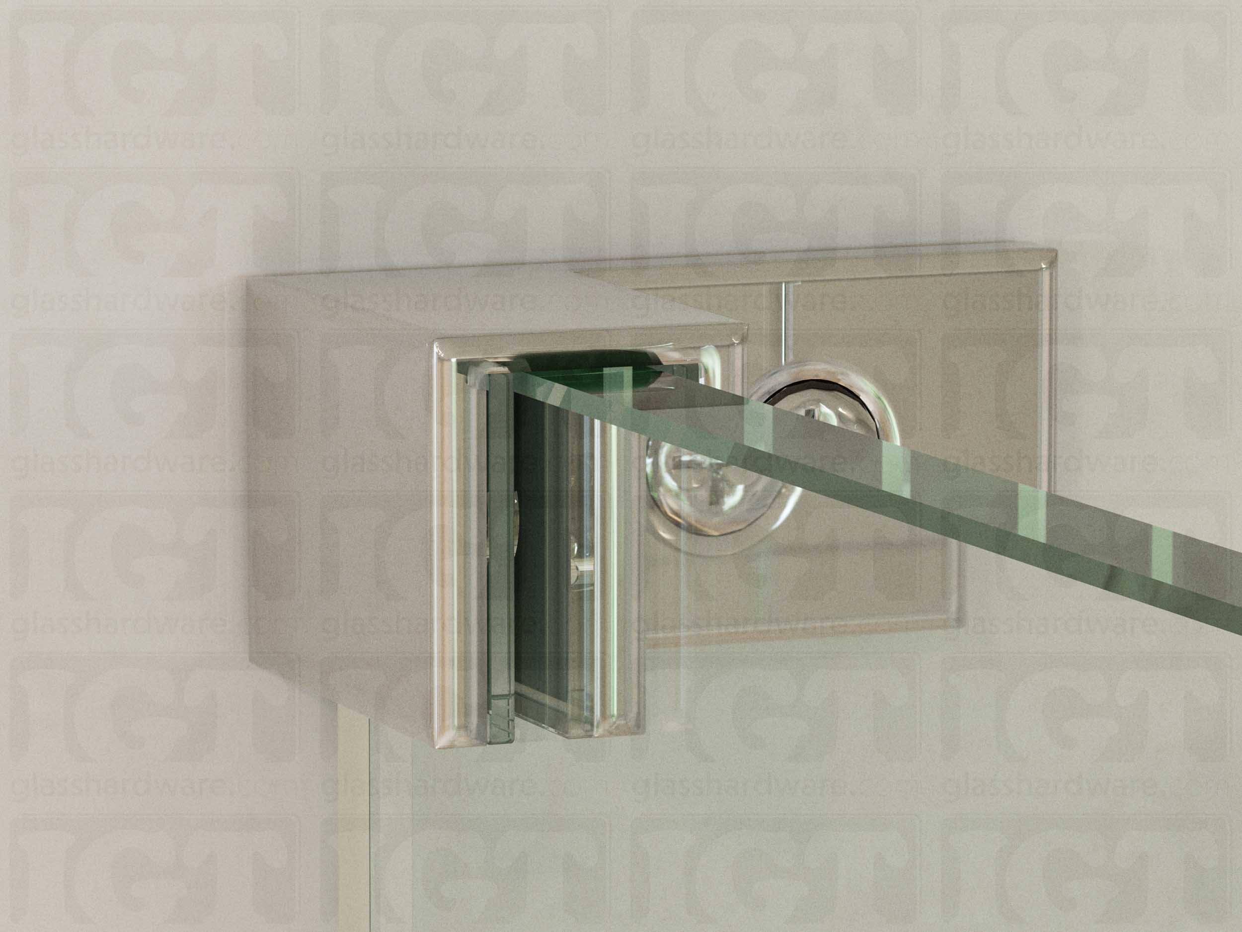 A close up of the Left Wall-to-Glass Sleeve Over Clamp mounted onto the glass panel. The glass is fitted securely into the clamps Solid Brass frame. Chrome Polished.