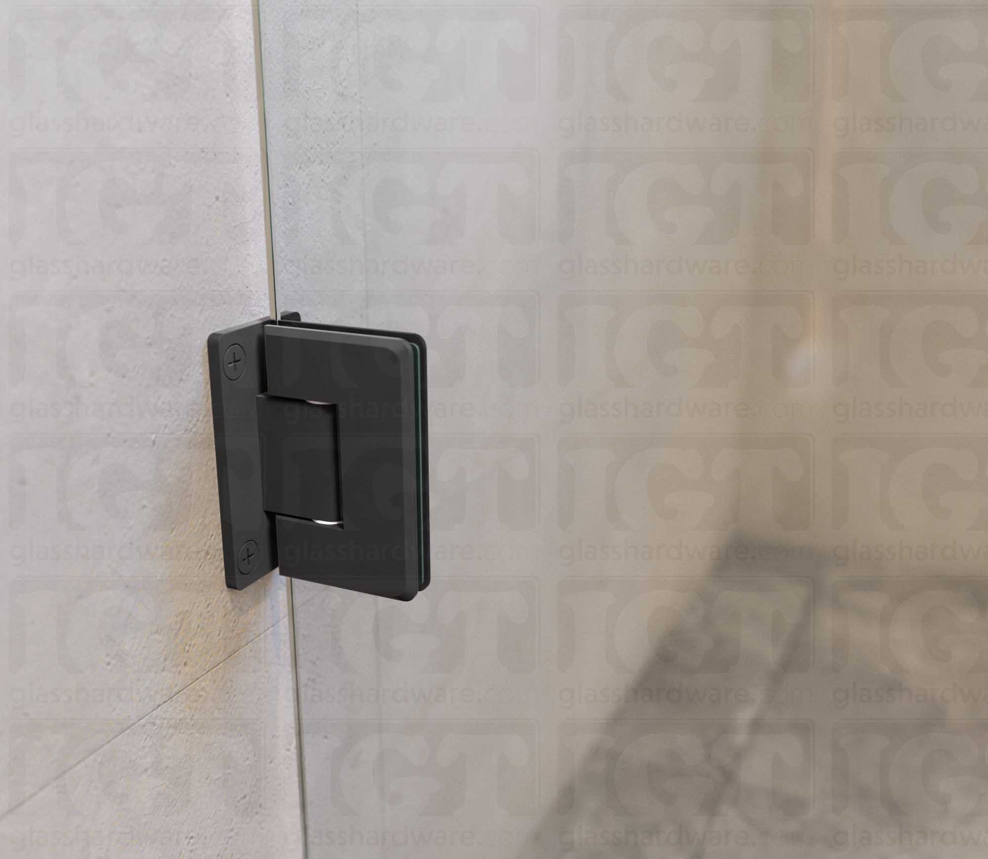 A close-up view of the Wall-to-Glass Full Back Bilboa Hinge used in a modern shower door installation, showcasing its Full Back Plate fixed to the wall. Matte Black.