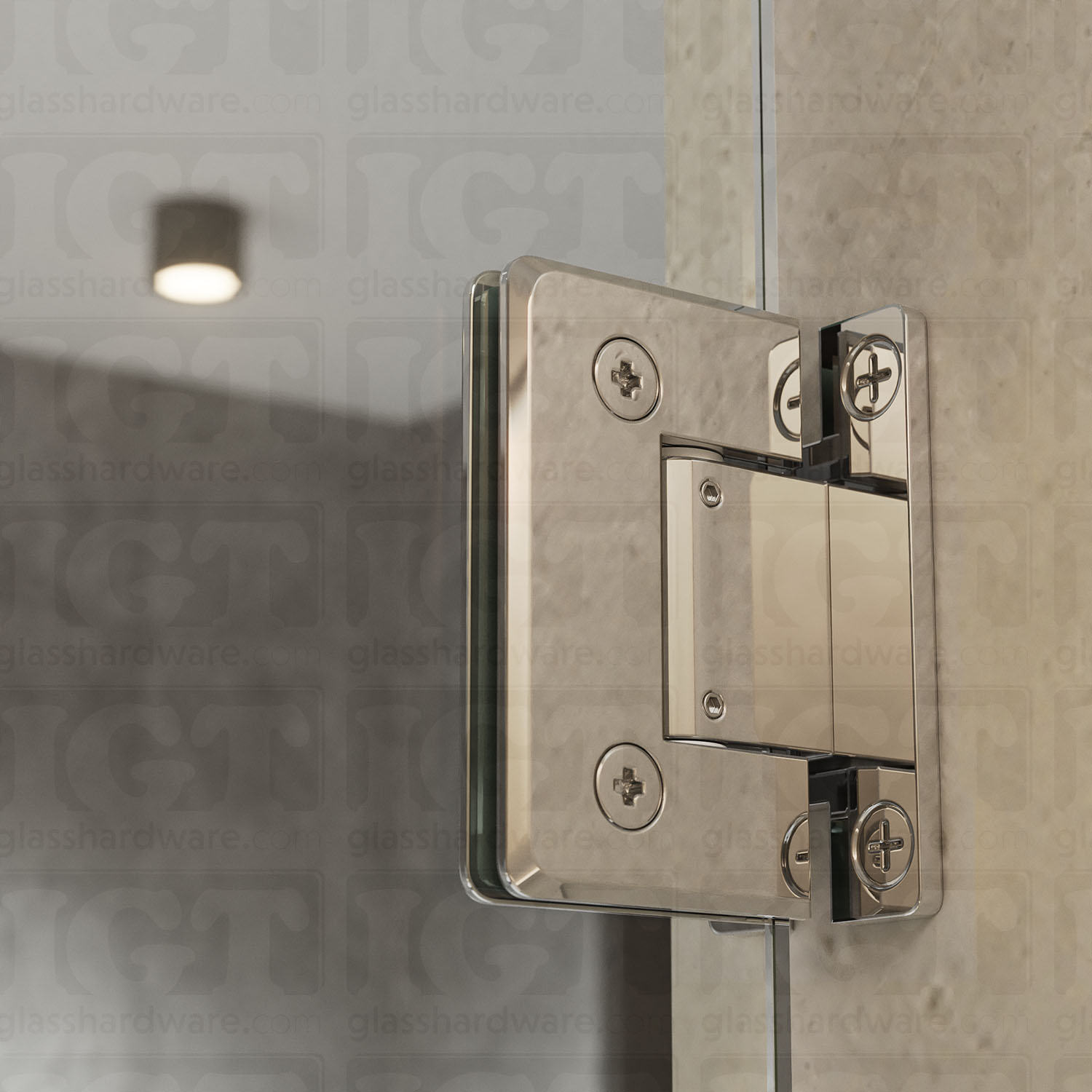 A close up view of the Adjustable Wall-to-Glass “H” Back Bilboa Hinge from inside the shower, showcasing it's sleek beveled edge design. Chrome Polished.