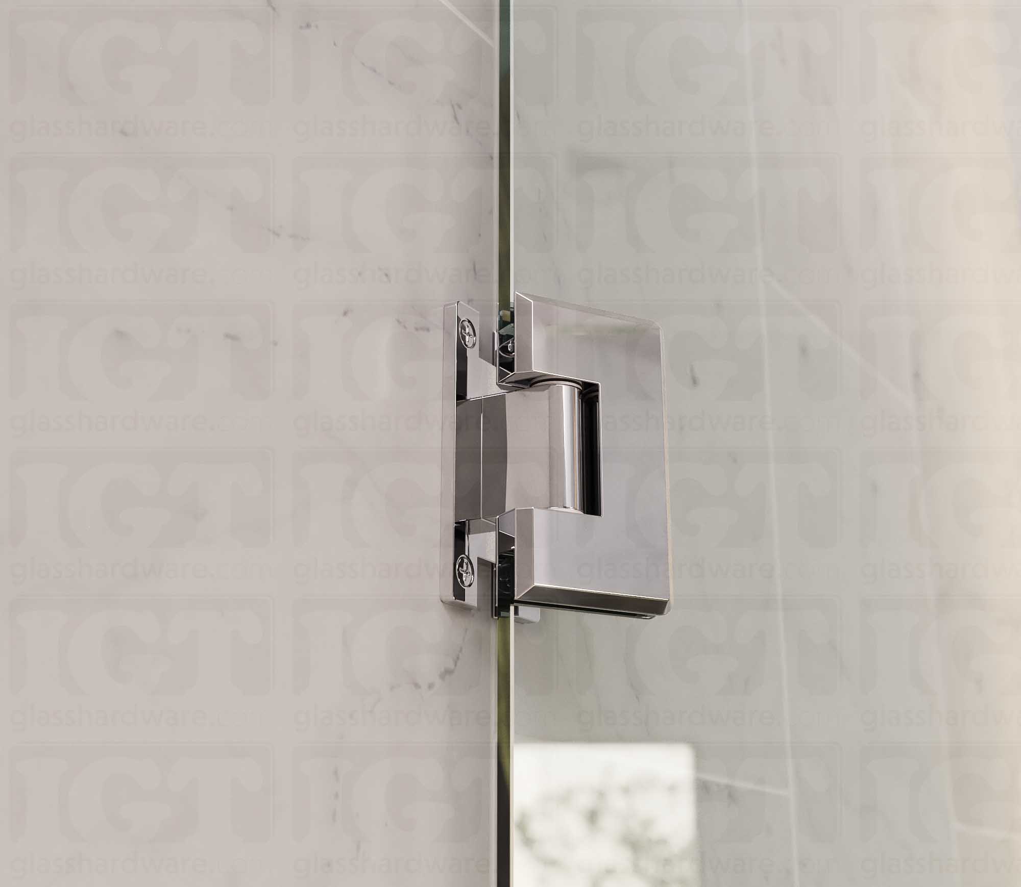 A close up view of the Heavy Duty Wall-to-Glass “H” Back Bilboa Hinge installed on a frameless glass shower door. Chrome Polished.