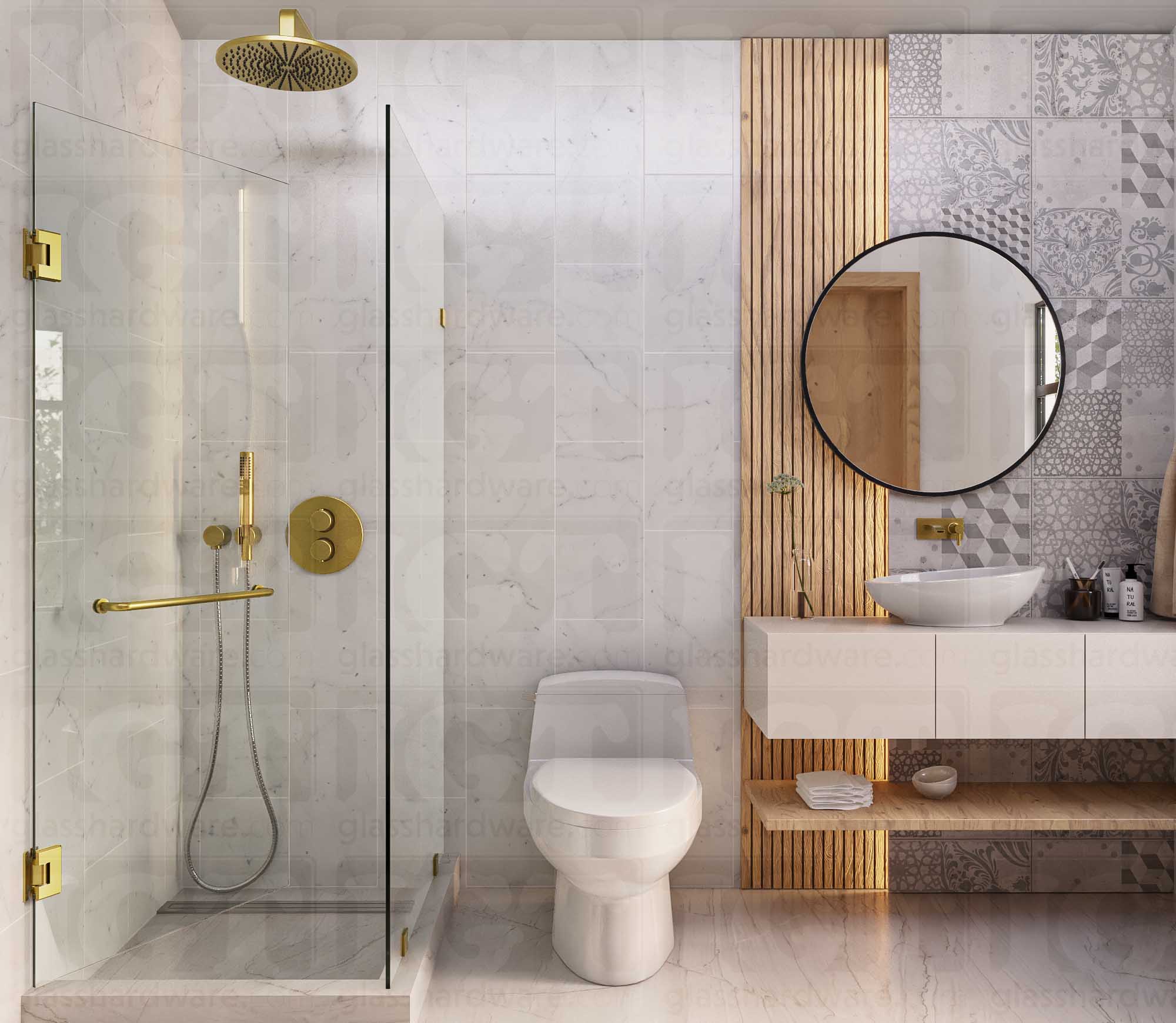 A modern bathroom with a frameless glass shower enclosure. The glass shower door is secured with two Heavy Duty Wall-to-Glass “H” Back Bilboa Hinges in Gold Brushed.