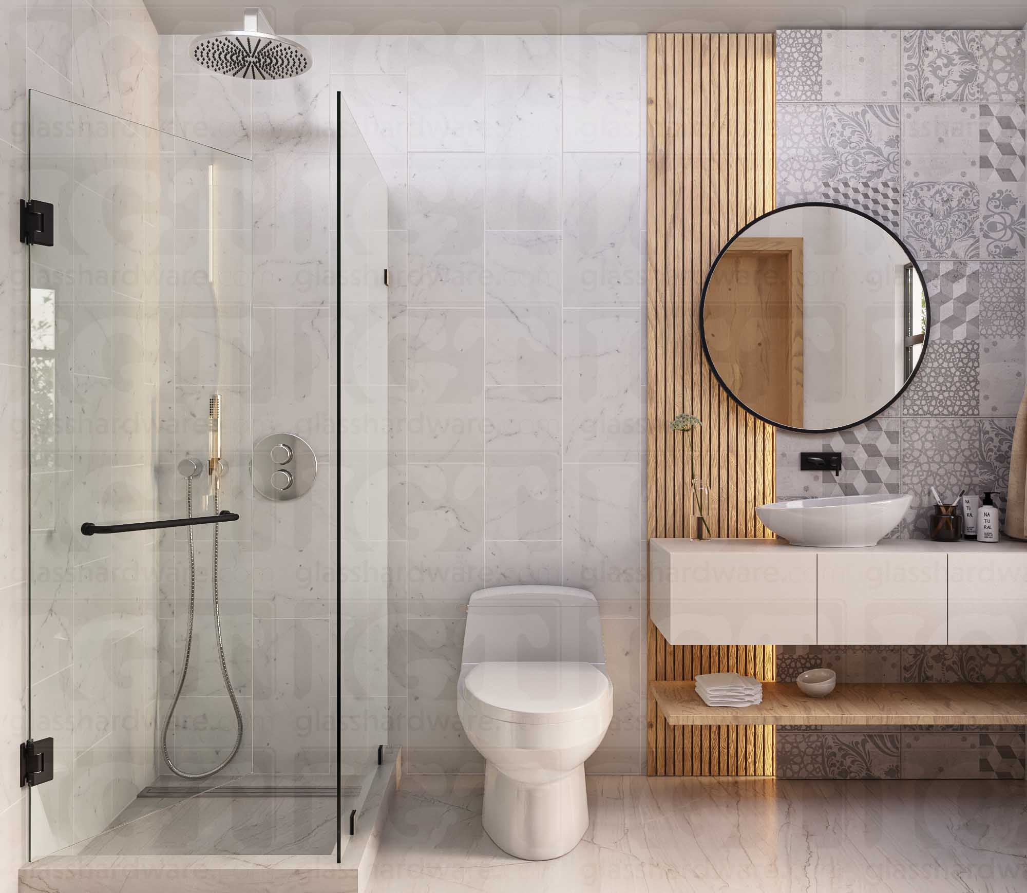 A modern bathroom with a frameless glass shower enclosure. The glass shower door is secured with two Heavy Duty Wall-to-Glass “H” Back Bilboa Hinges in Matte Black.