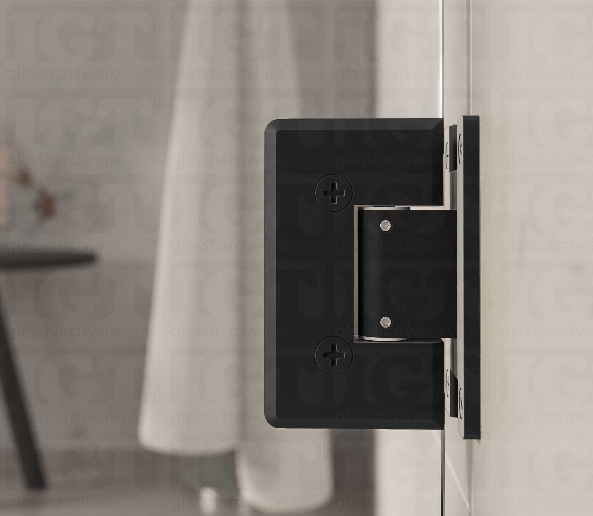 A close-up view from inside the shower of the Heavy Duty Adjustable Wall-to-Glass "H" Back Bilboa Hinge. Matte Black.