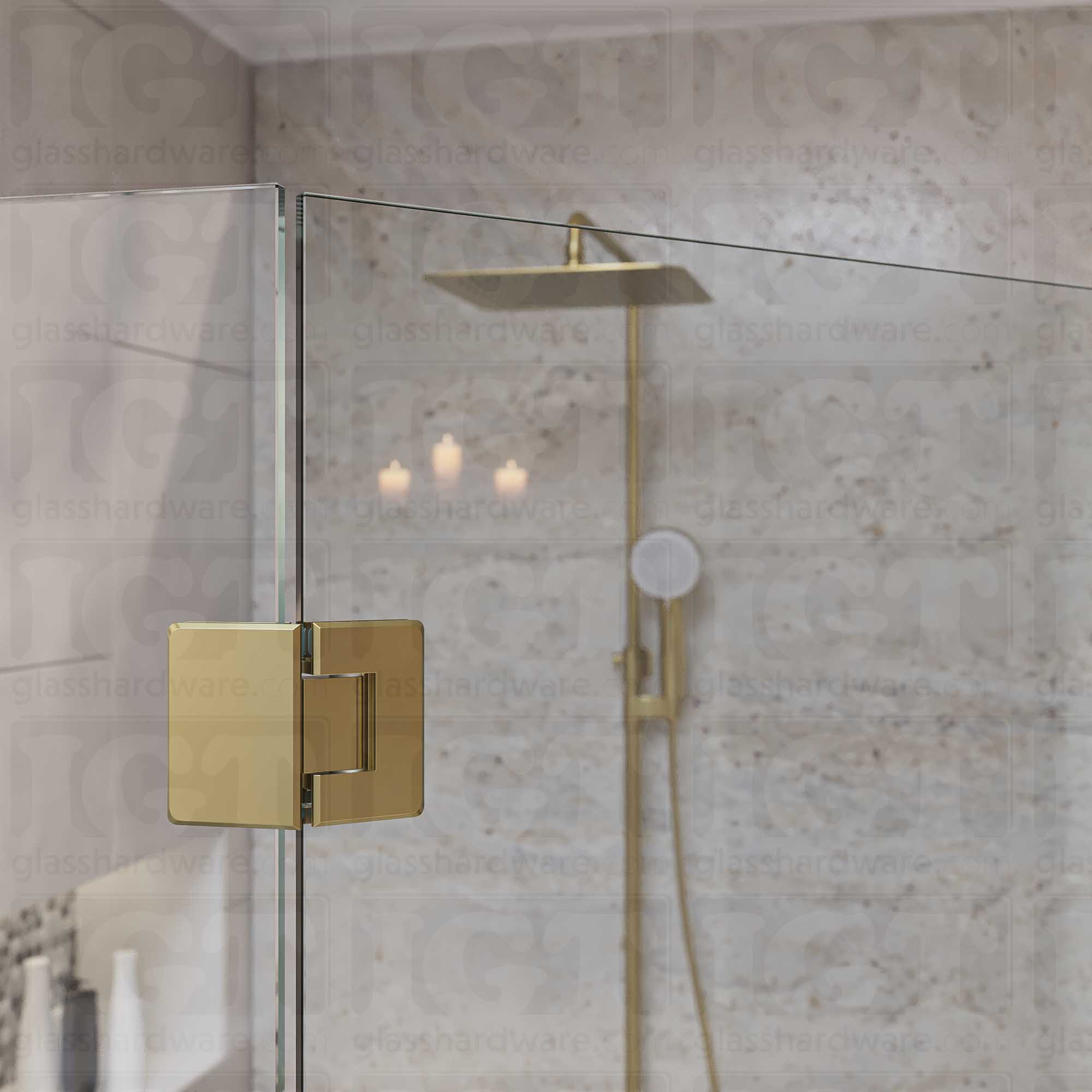 A close-up view of the Glass-to-Glass 135 Degree Bilboa Hinge installed on a modern shower door, showcasing its Gold Brushed finish in more detail.