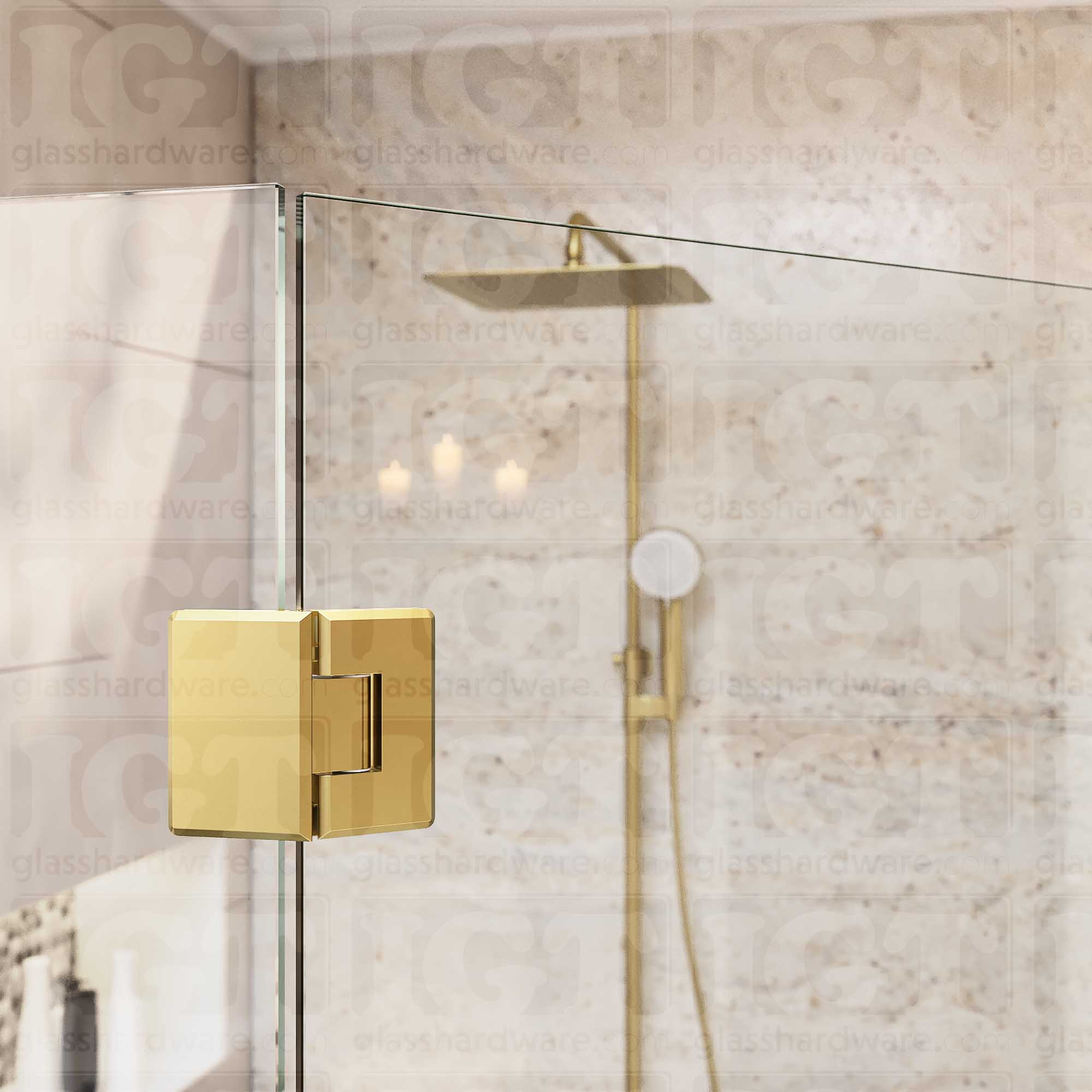 A close-up view of the top Heavy Duty Adjustable Glass-to-Glass 135 Degree Bilboa Hinge installed on a modern shower door, showcasing how the hinge securely holds the adjacent glass panels. Gold Brushed.