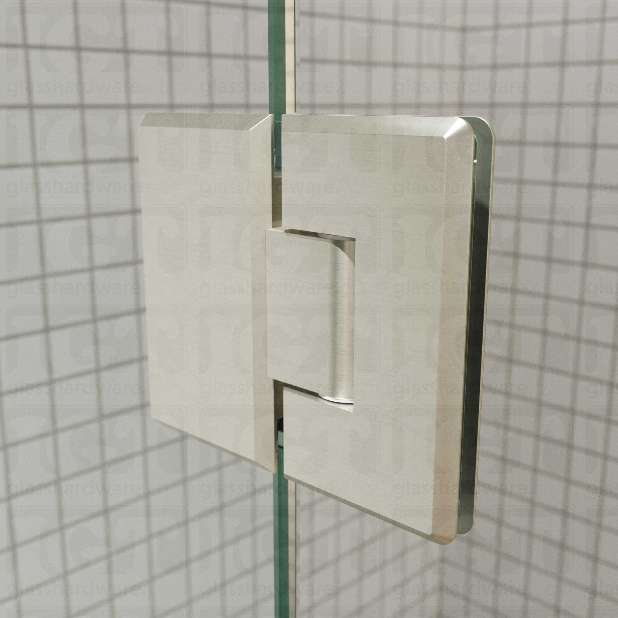 A close-up view of the Heavy Duty Glass-to-Glass 180 Degree Bilboa Hinge installed on a modern shower door, showcasing its Brushed Nickel finish in more detail.