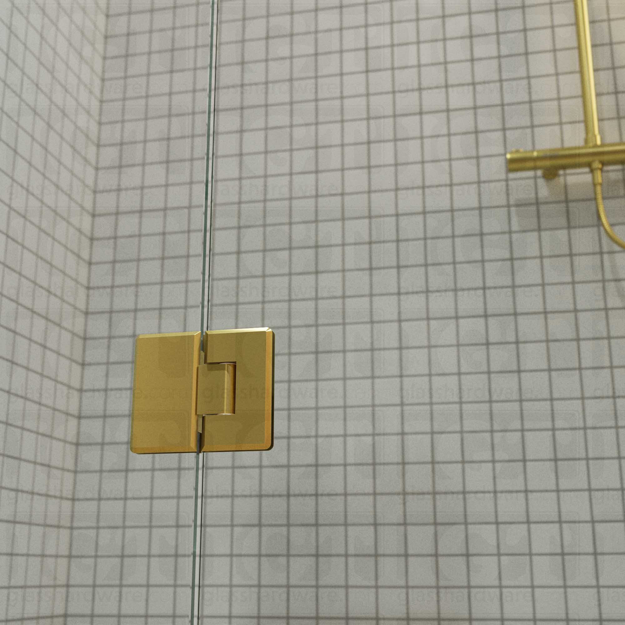 A close-up view of the bottom Heavy Duty Glass-to-Glass 180 Degree Bilboa Hinge installed on a modern shower door. Gold Brushed.