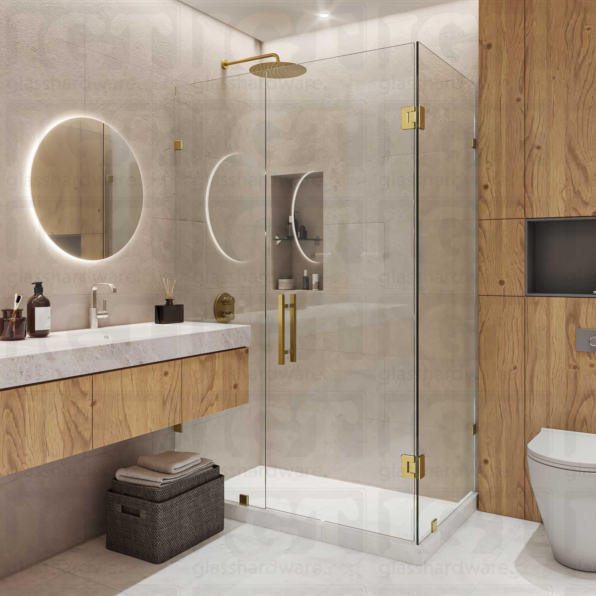 A modern frameless shower door installation using two Glass-to-Glass 90 Degree Bilboa Hinge. Gold Brushed.