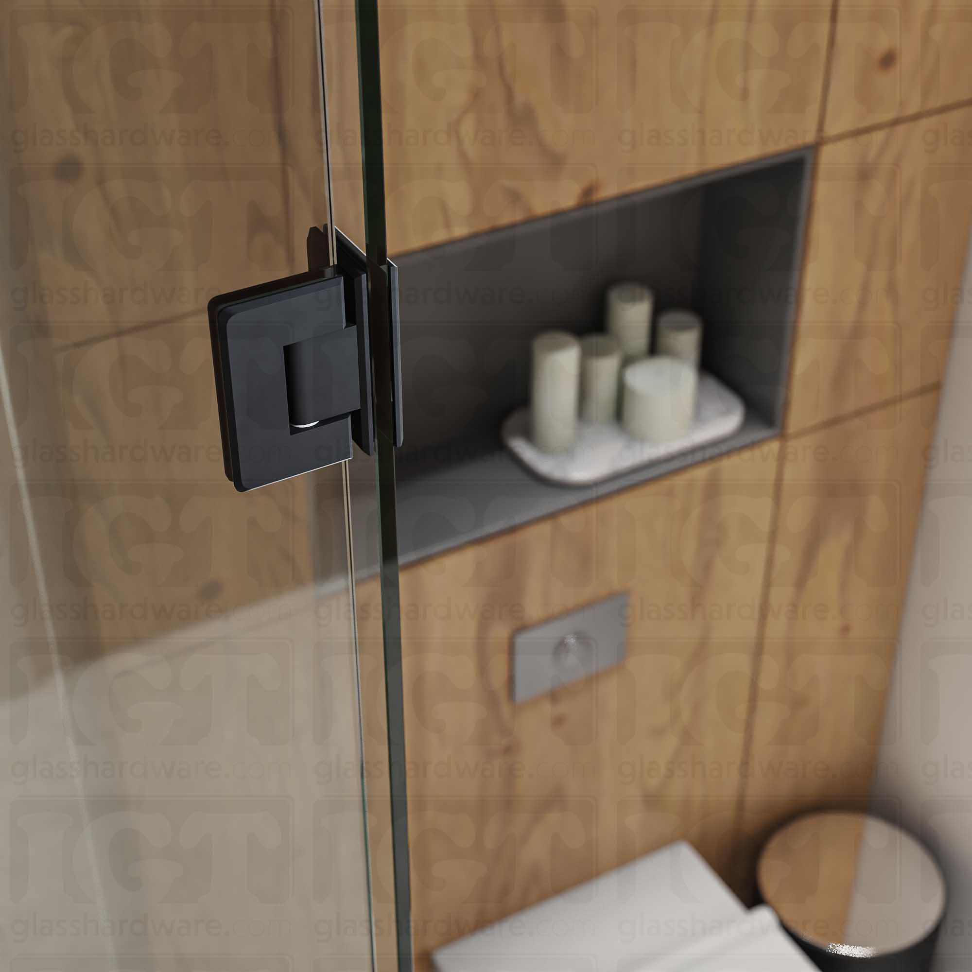 A close-up view of the Glass-to-Glass 90 Degree Bilboa Hinge installed on a modern shower door, showcasing its Matte Black finish in more detail.