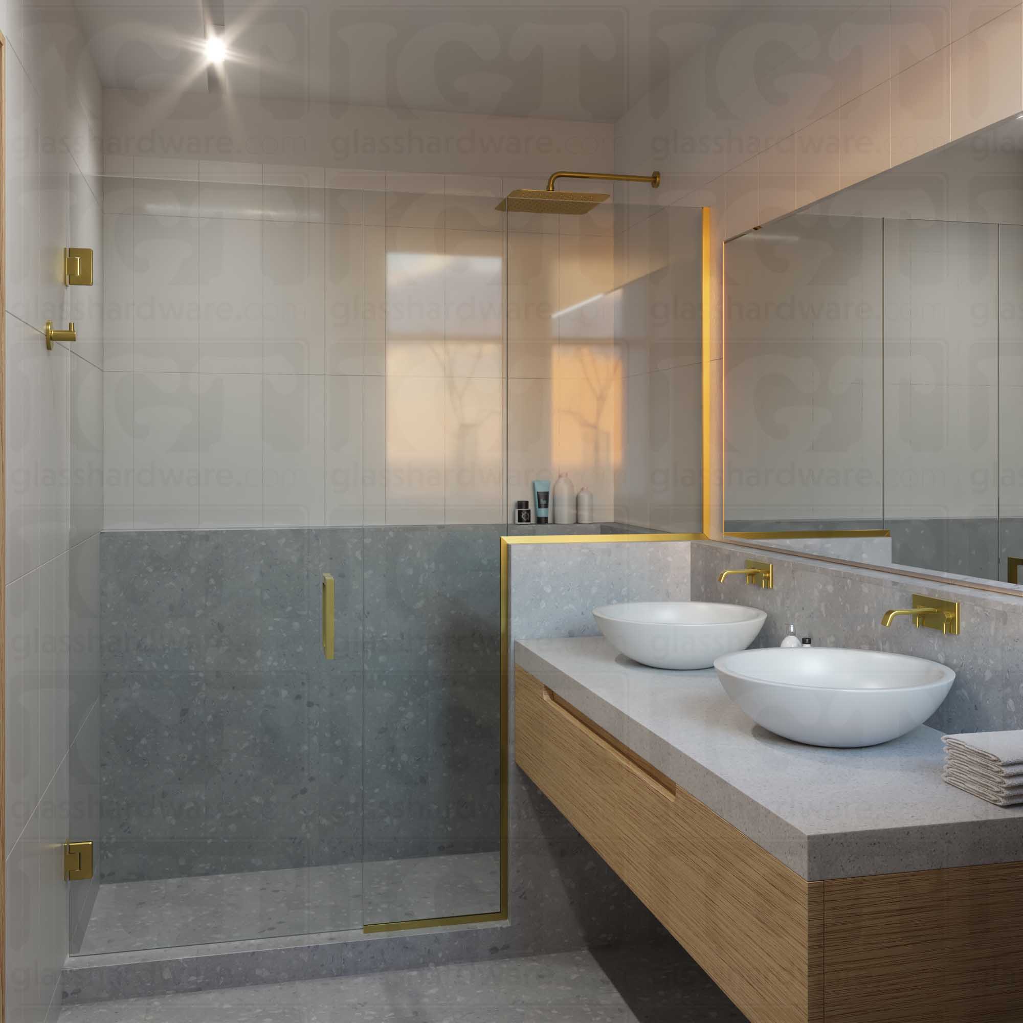 A modern shower door installation using two Wall-to-Glass Offset Back Bilboa Hinges. Gold Brushed.