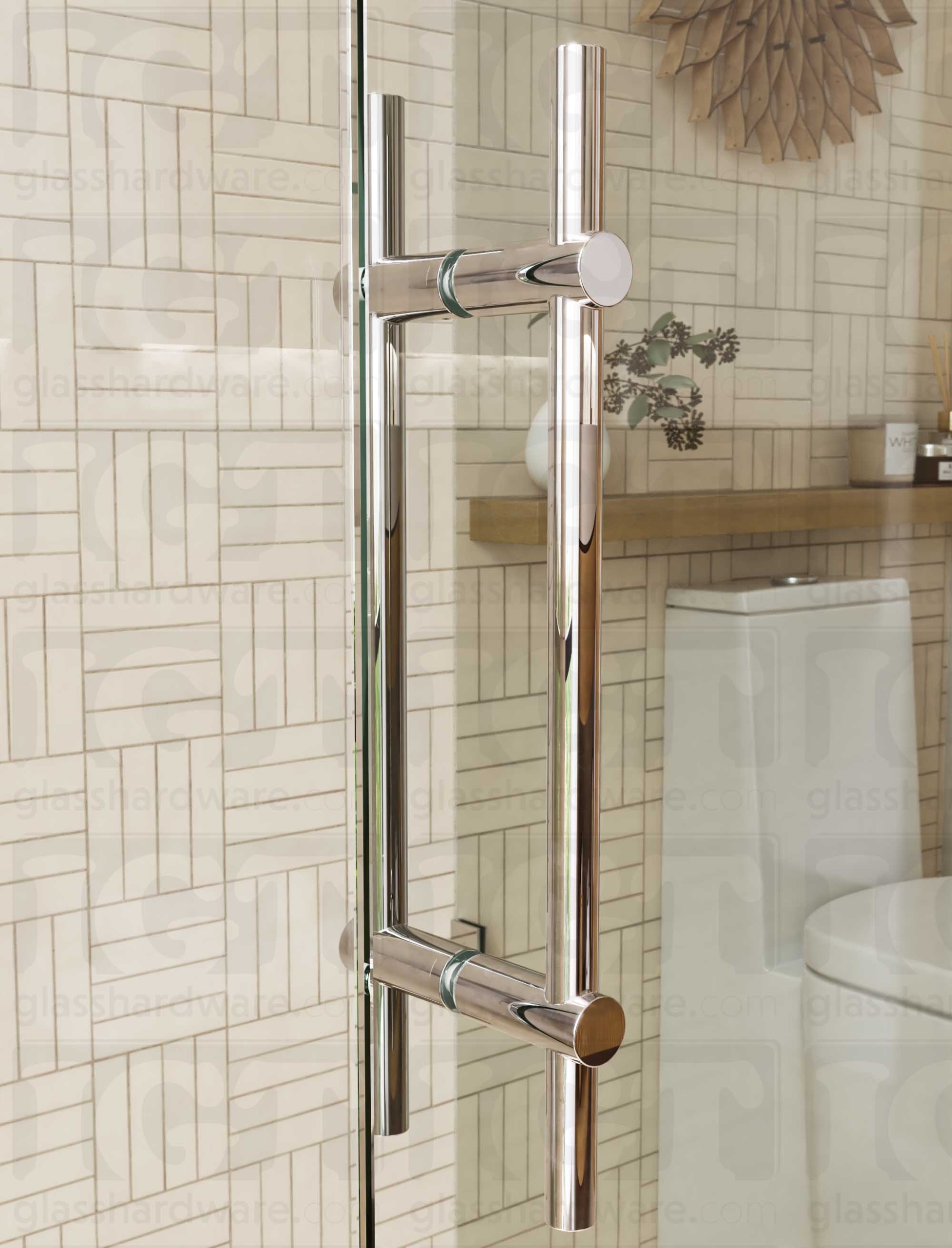 Close up view of the 16" Round Adjustable Ladder Handle installed on a glass shower door. The handle's adjustable posts are configued to 14" center-to-center, and are firmly secured to the glass panel. Chrome Polished.