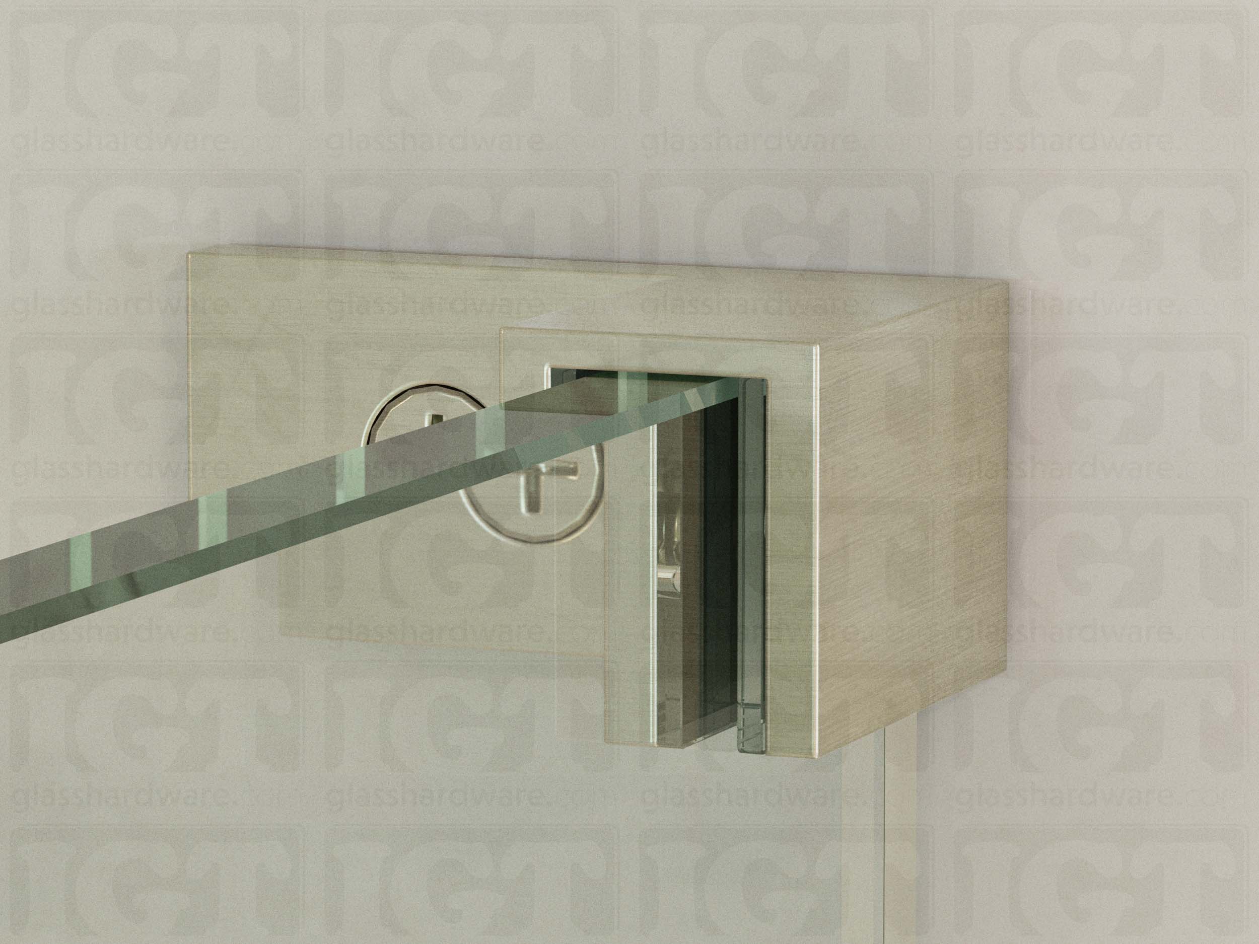 A close up of the Right Wall-to-Glass Sleeve Over Clamp mounted onto the glass panel. The glass is fitted securely into the clamps Solid Brass frame. Brushed Nickel.