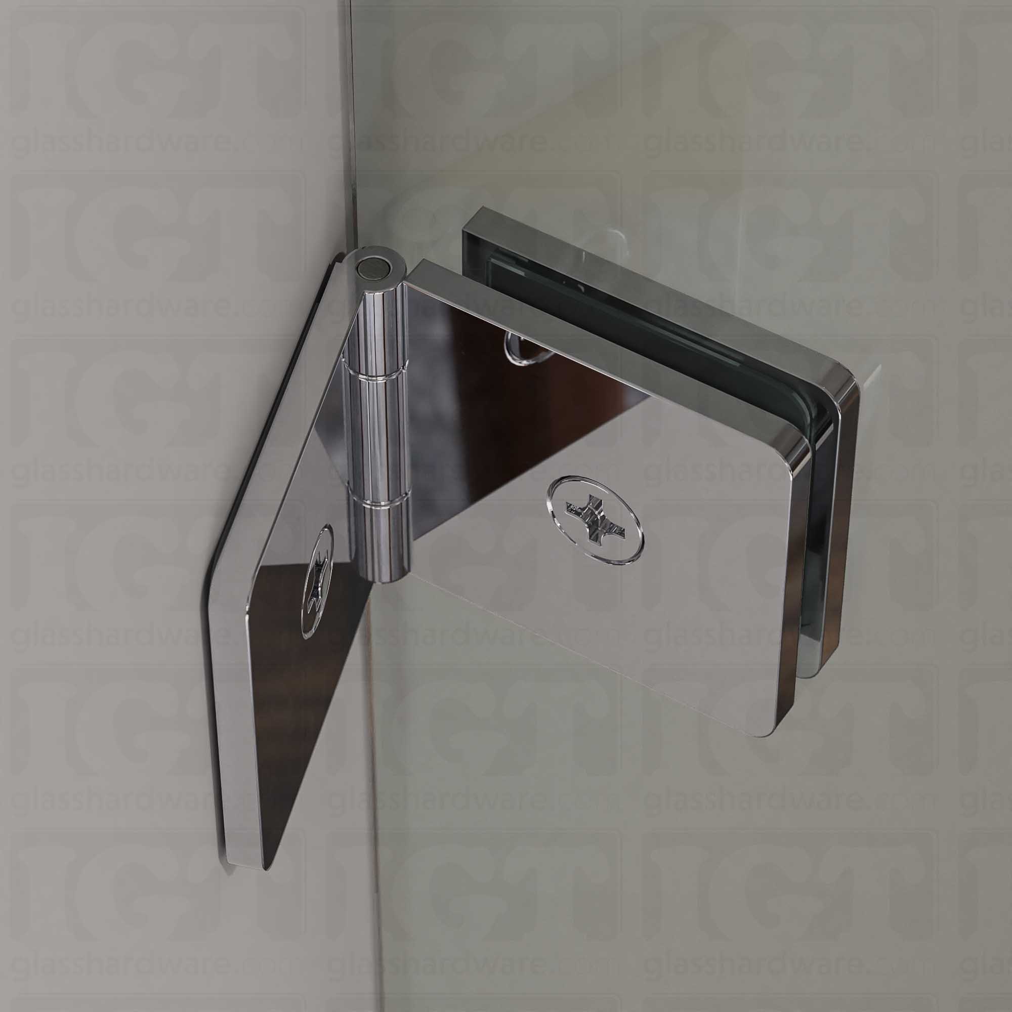 A close up of the Glass-to-Glass Adjustable Clamp mounted to the wall. The clamp is securely holding the shower's glass panel in place. Chome Polished.