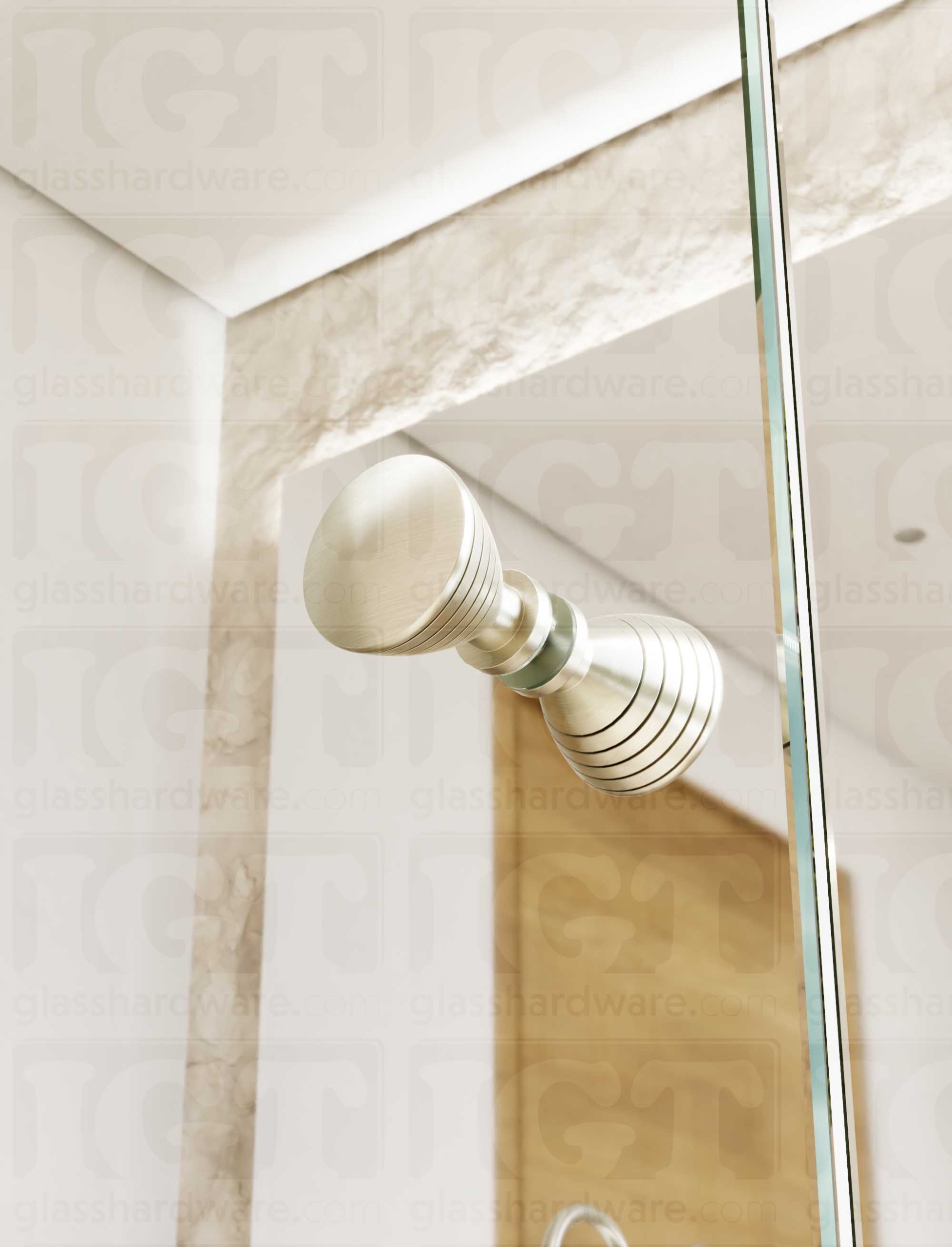 A close up from below of the Ribbed Bow Tie Style Back-to-Back Door Knob installed on a glass shower door. Soft natural light highlights the knob's Brushed Nickel finish.