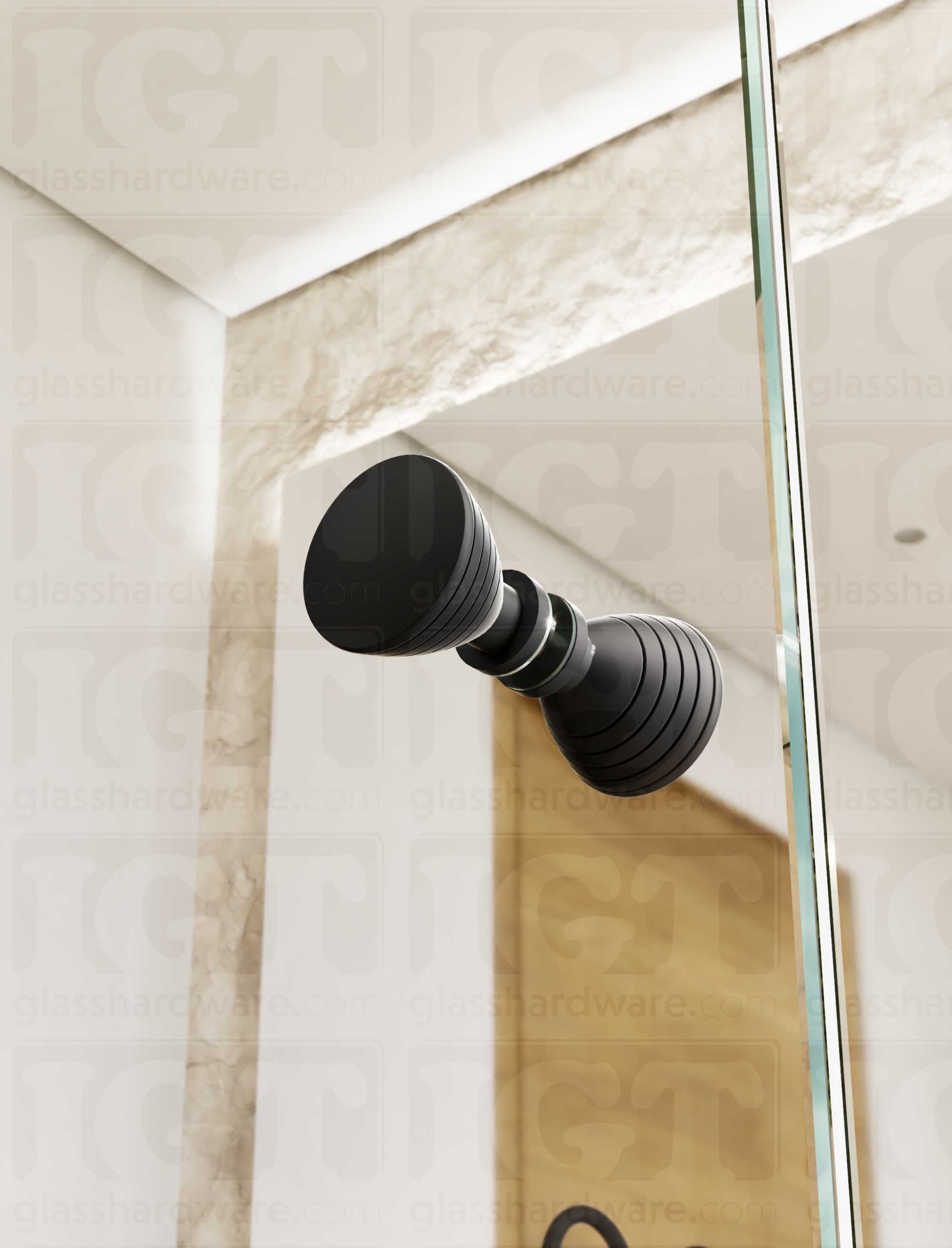 A close up from below of the Ribbed Bow Tie Style Back-to-Back Door Knob installed on a glass shower door. Soft natural light highlights the knob's Matte Black finish.