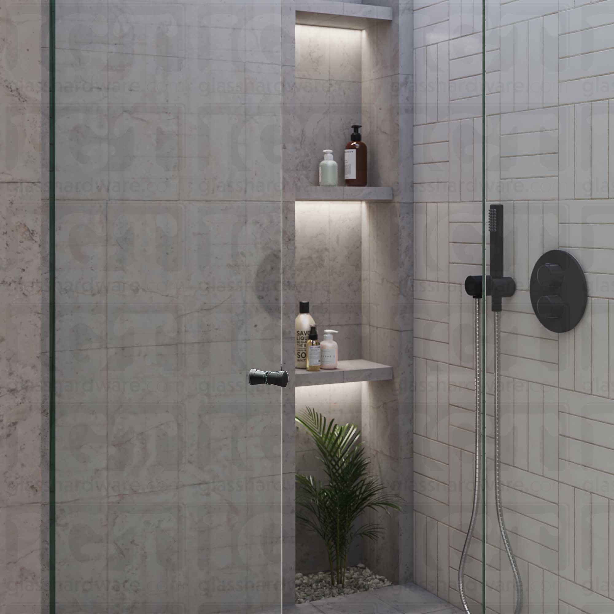 A glass shower door in the open position featuring the Modern Ribbed Bow Tie Back-to-Back Door Knob. Matte Black.