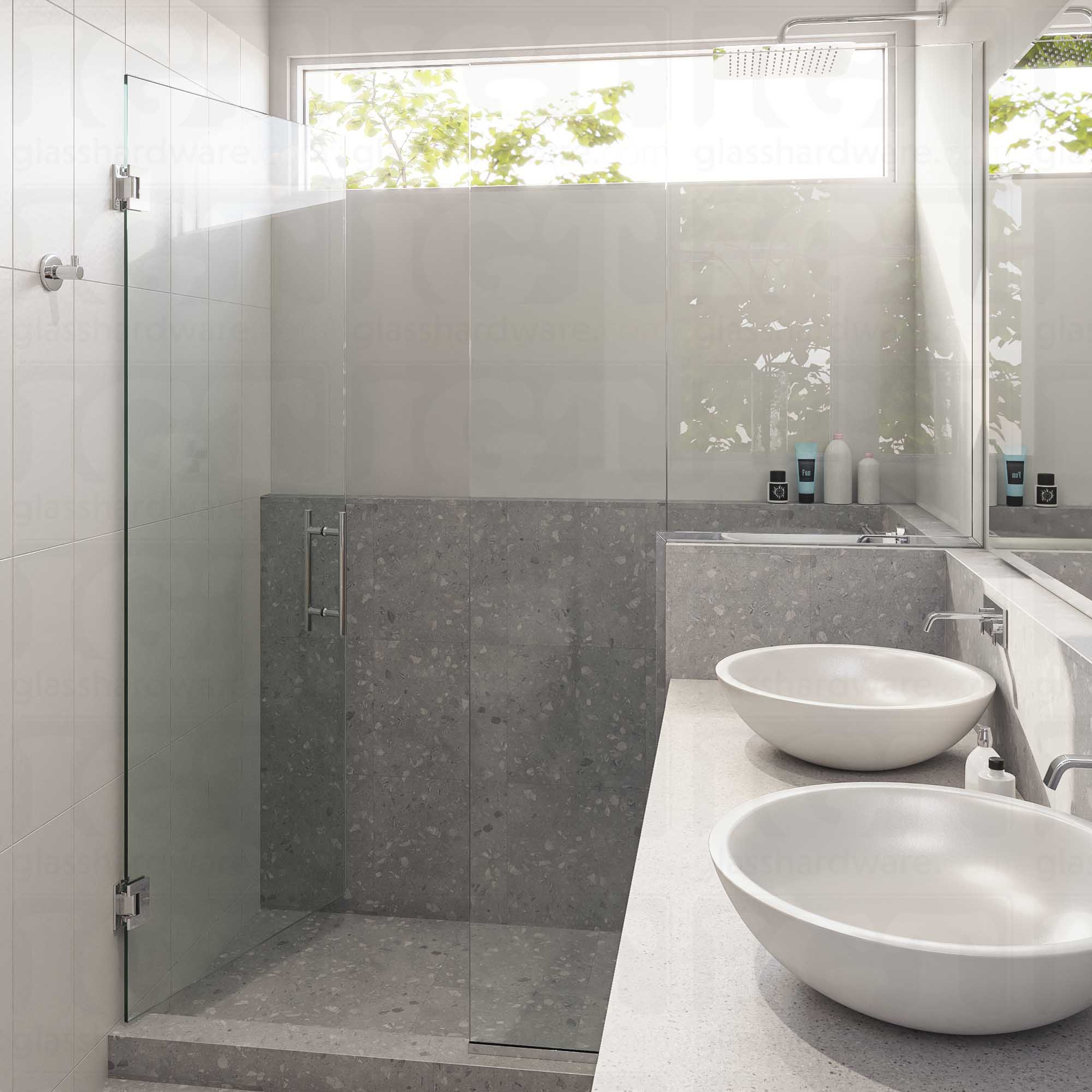 A modern bathroom with a semi-frameless glass shower enclosure featuring the 8" Center-to-Center Round Ladder Handle. Chrome Polished.