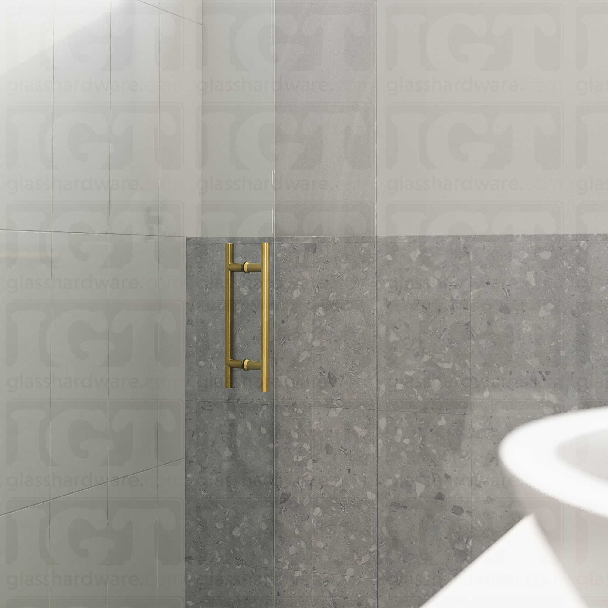 A close-up of the 8" Center-to-Center Round Ladder Handle installed on an open frameless glass shower door, showcasing its back-to-back design. Gold Brushed.