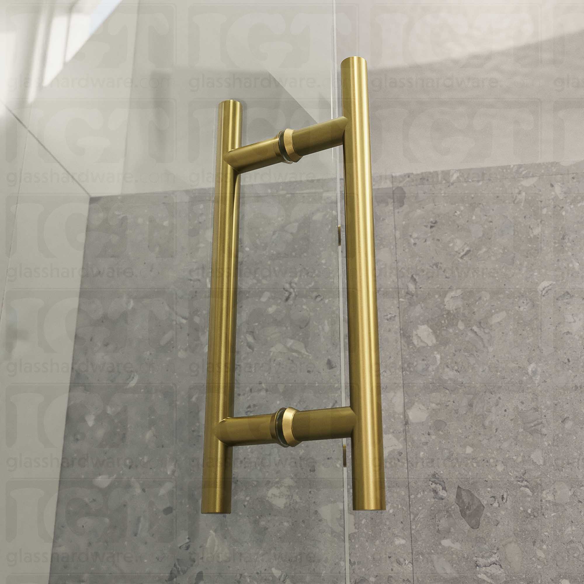 An angled close-up of the 8" Center-to-Center Round Ladder Handle installed on a frameless glass shower door, showing its 304 Stainless Steel construction in more detail. Gold Brushed.