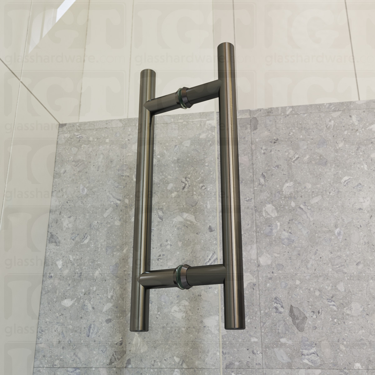 A close-up from of the 8" Center-to-Center Round Ladder Handle installed on a frameless glass shower door, showcasing its slim ladder style design. Polished Gun Metal.