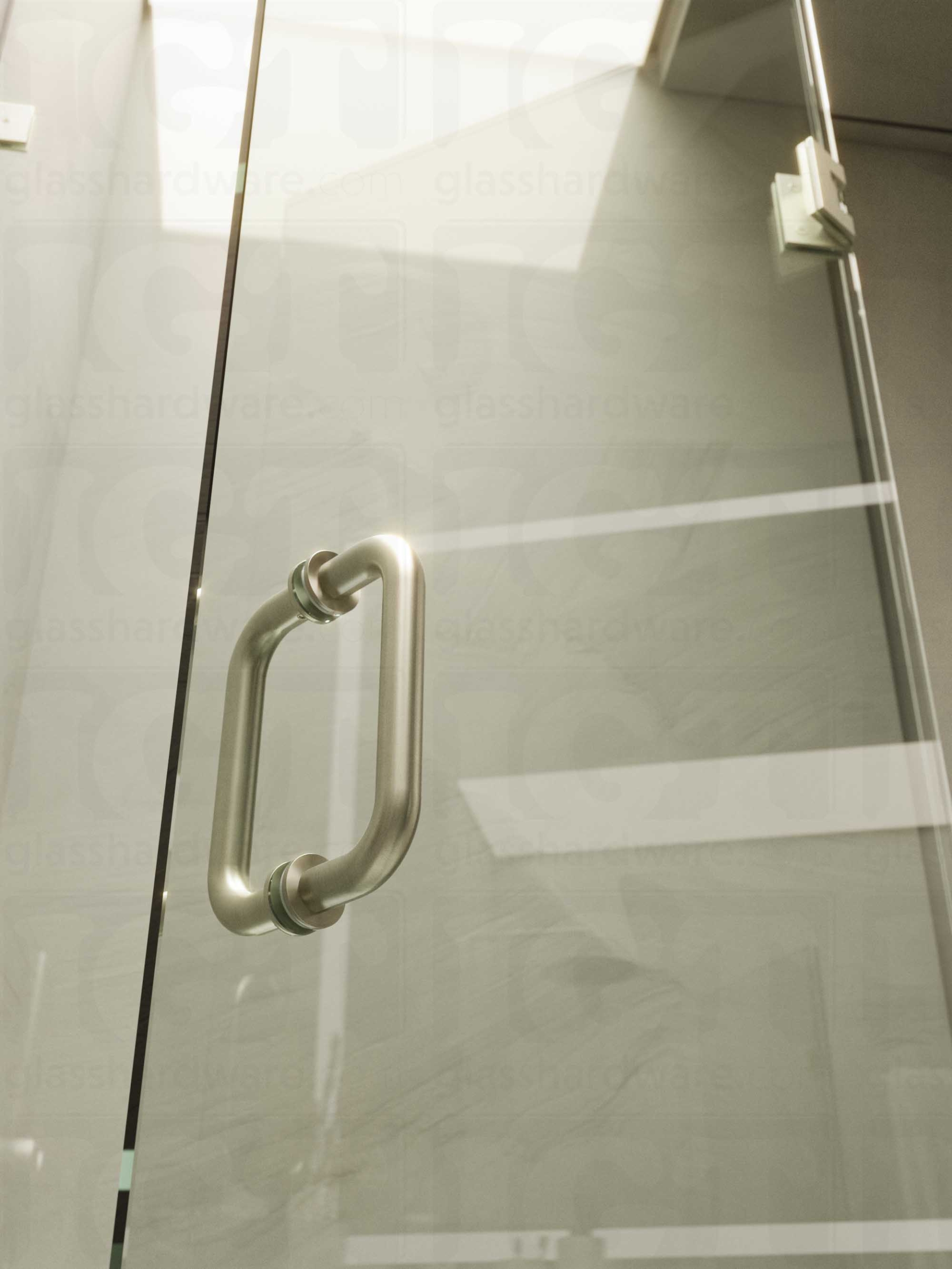 A close-up of the 6" Round Pull Handle installed on a frameless glass shower door, showcasing it's 304 Stainless Steel construction. Brushed Nickel.