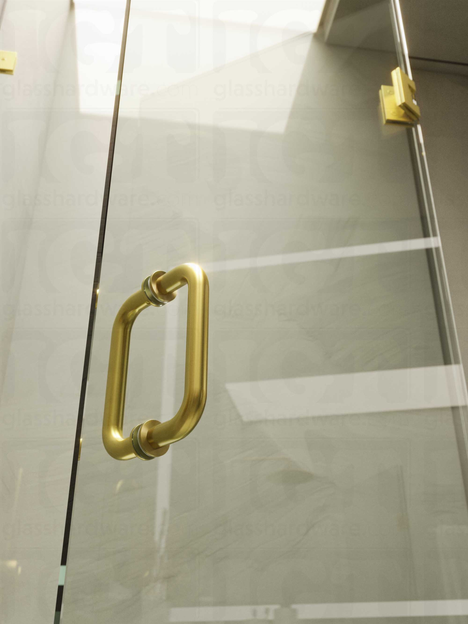 A close-up of the 6" Round Pull Handle installed on a frameless glass shower door, showcasing it's 304 Stainless Steel construction. Gold Brushed.