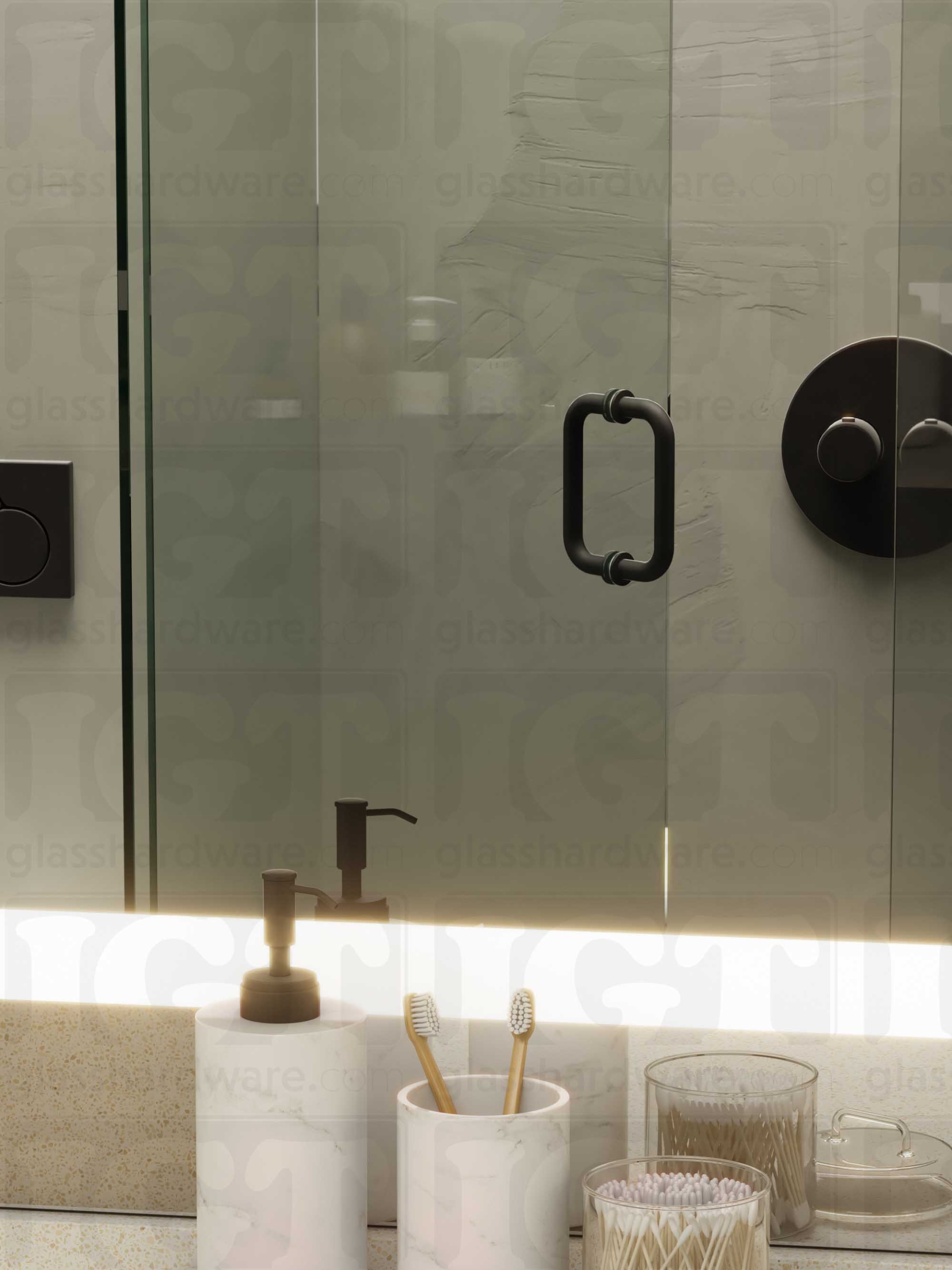 A frameless glass shower door in the open position, featuring the 6" Round Pull Handle. Matte Black.