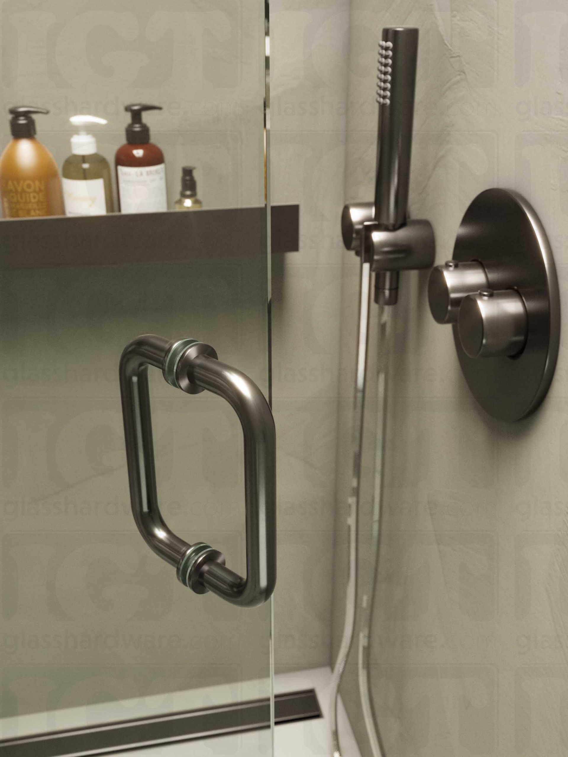 A close-up of the 6" Round Pull Handle installed on a frameless glass shower door, showcasing its back-to-back design. Polished Gun Metal.