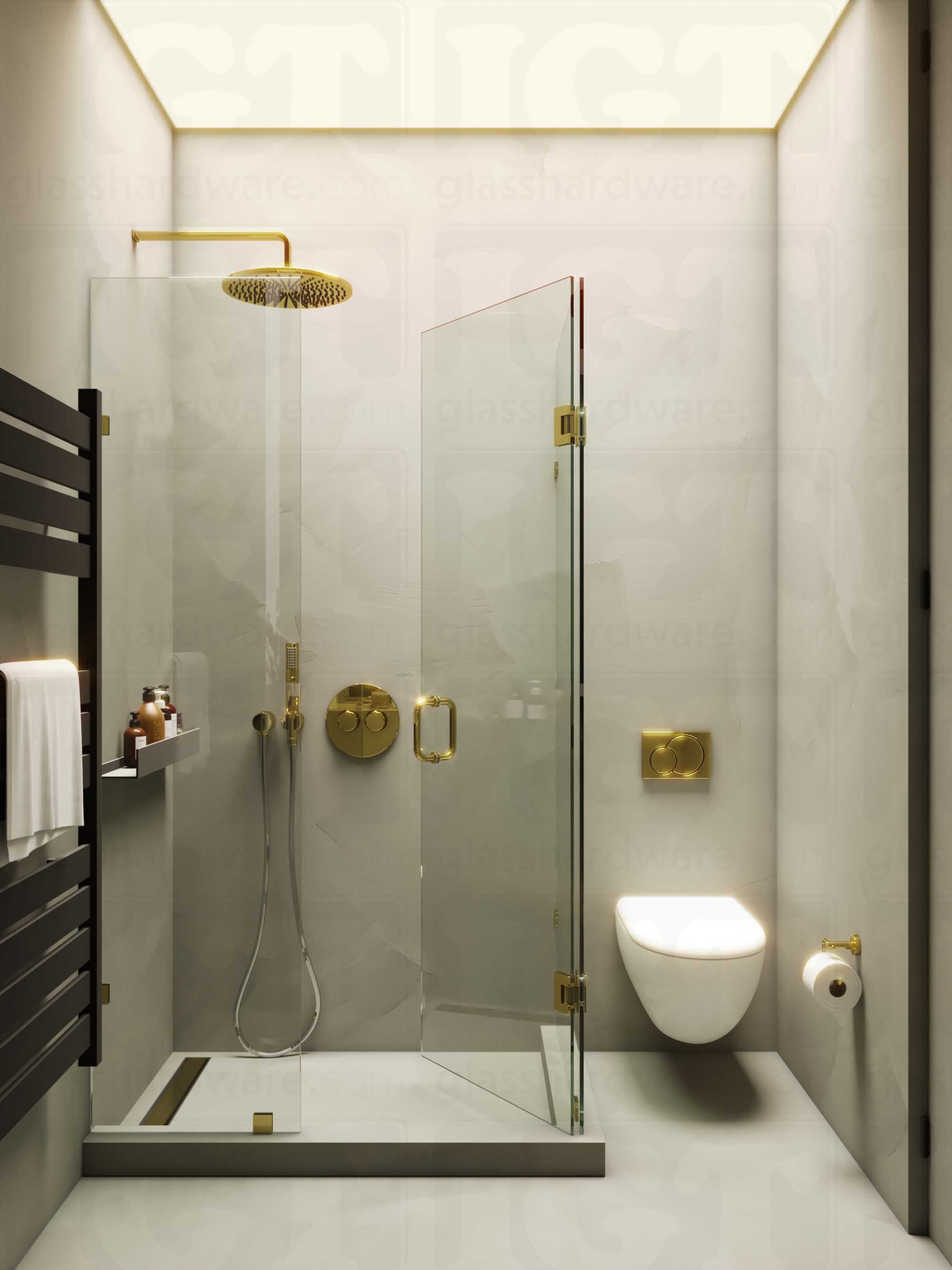 A modern bathroom with a frameless glass shower enclosure featuring the 6" Round Pull Handle, Polished Brass