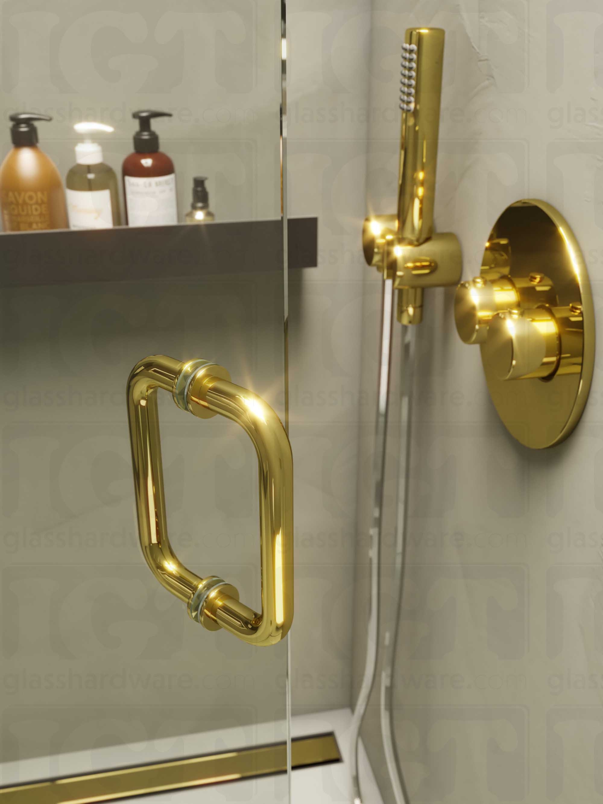 A close-up of the 6" Round Pull Handle installed on a frameless glass shower door, showcasing its back-to-back design. Polished Brass.