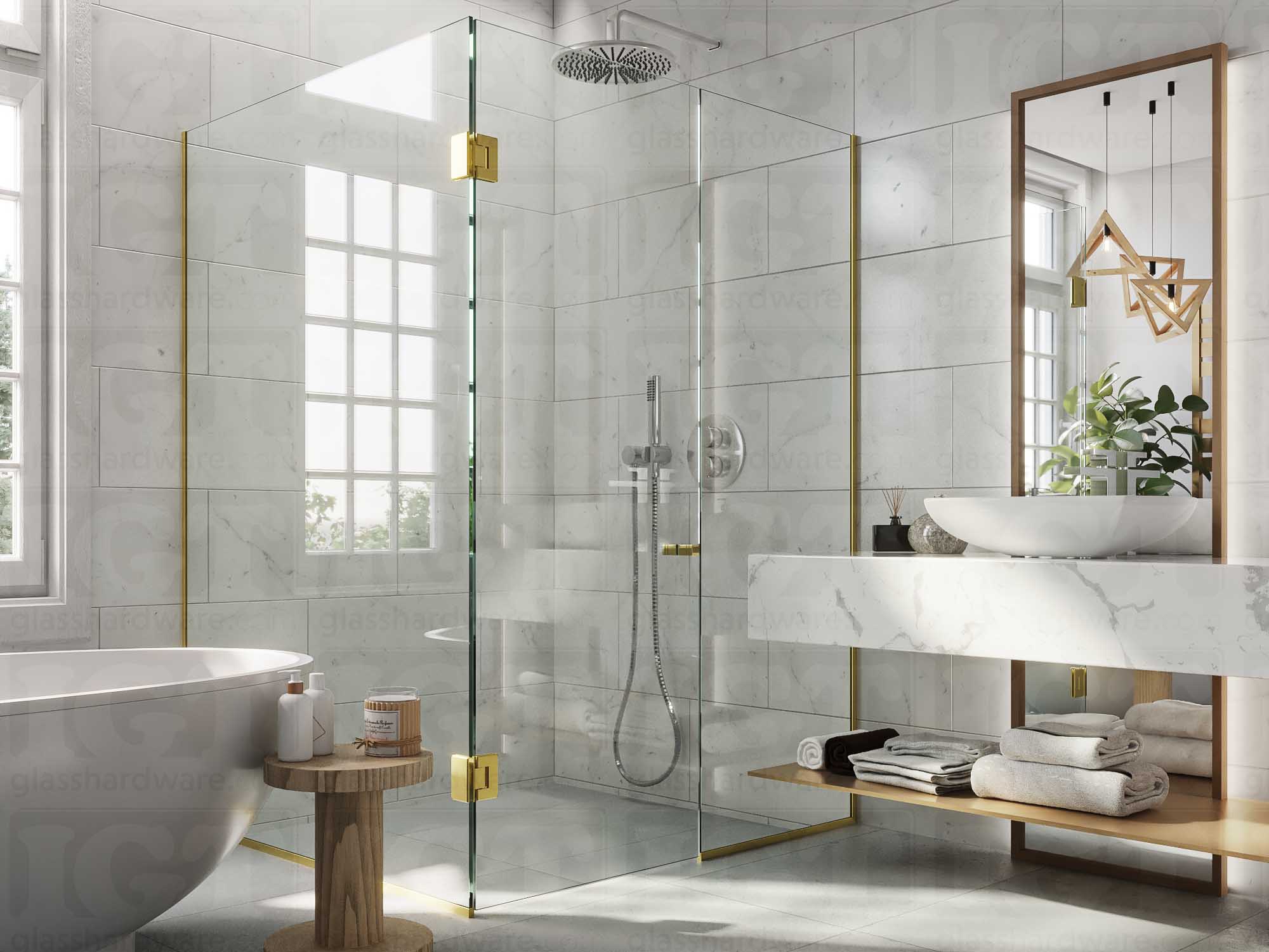 A modern bathroom with a frameless glass shower enclosure featuring the Square Back-to-Back Door Knob in Gold Brushed.